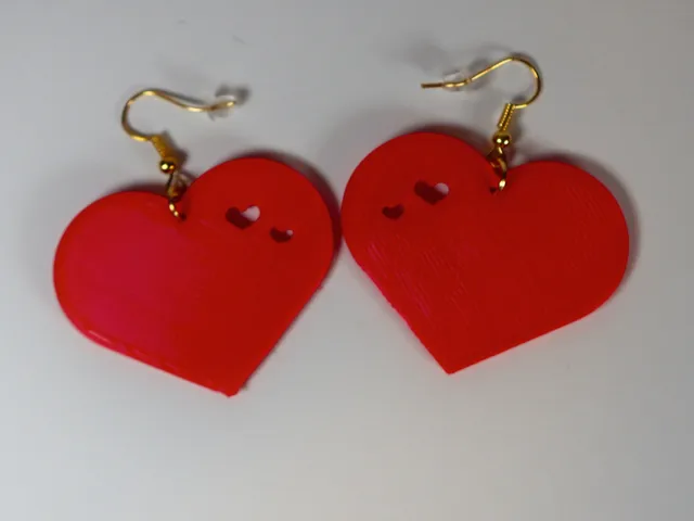 Heart earring with small hearts