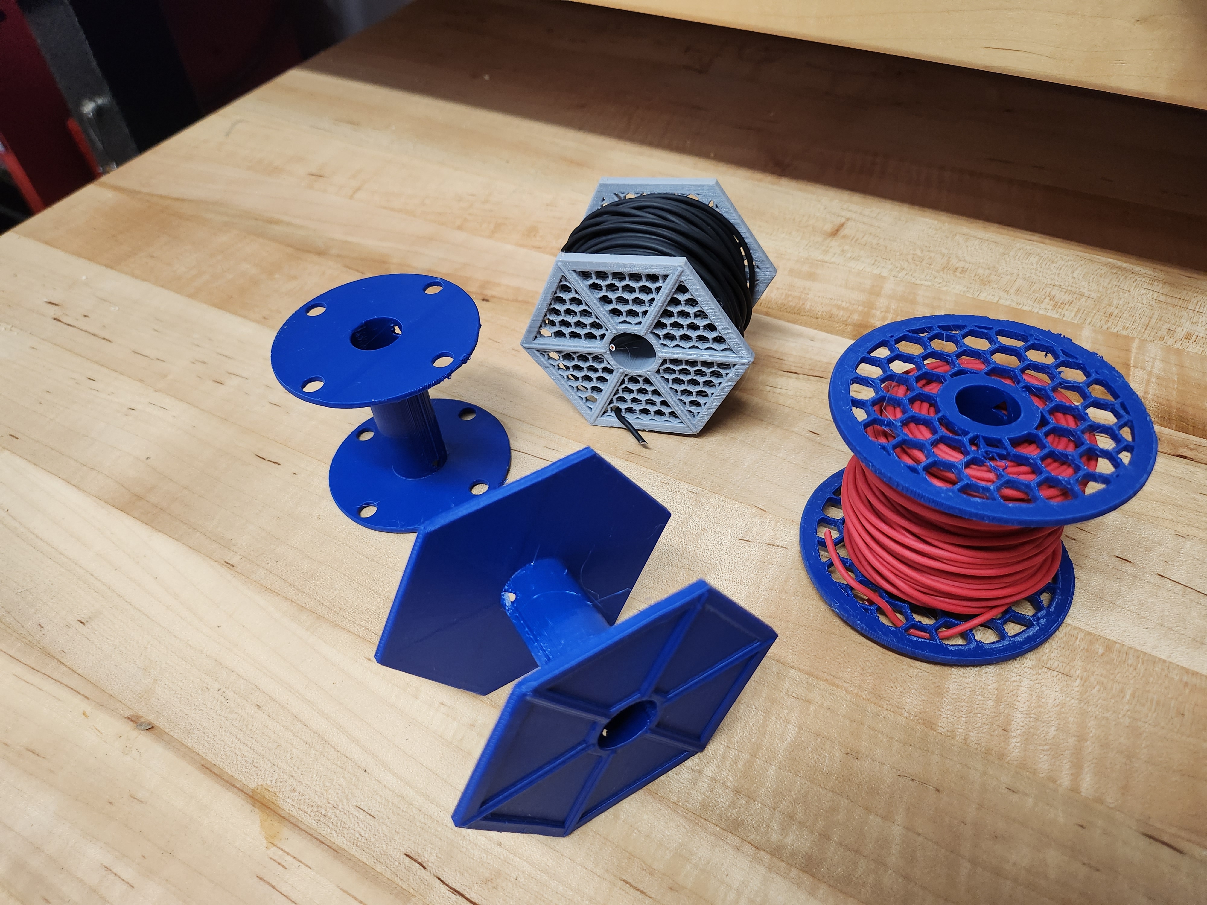Wire spool including Tie Fighter mode, OpenSCAD parametric