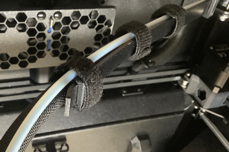 Core One L swing arm bowden support clip