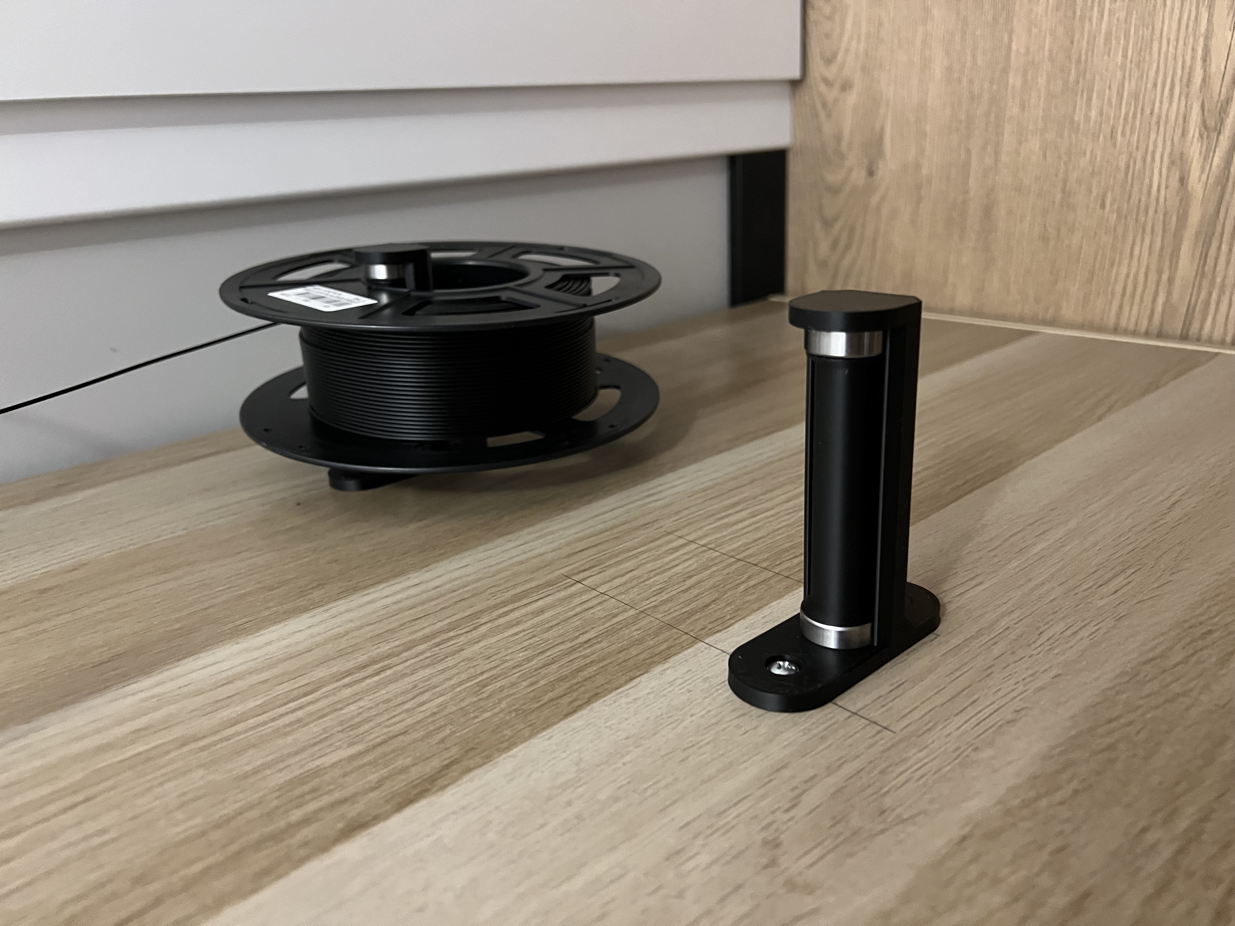 Wall mount slim filament spool holder