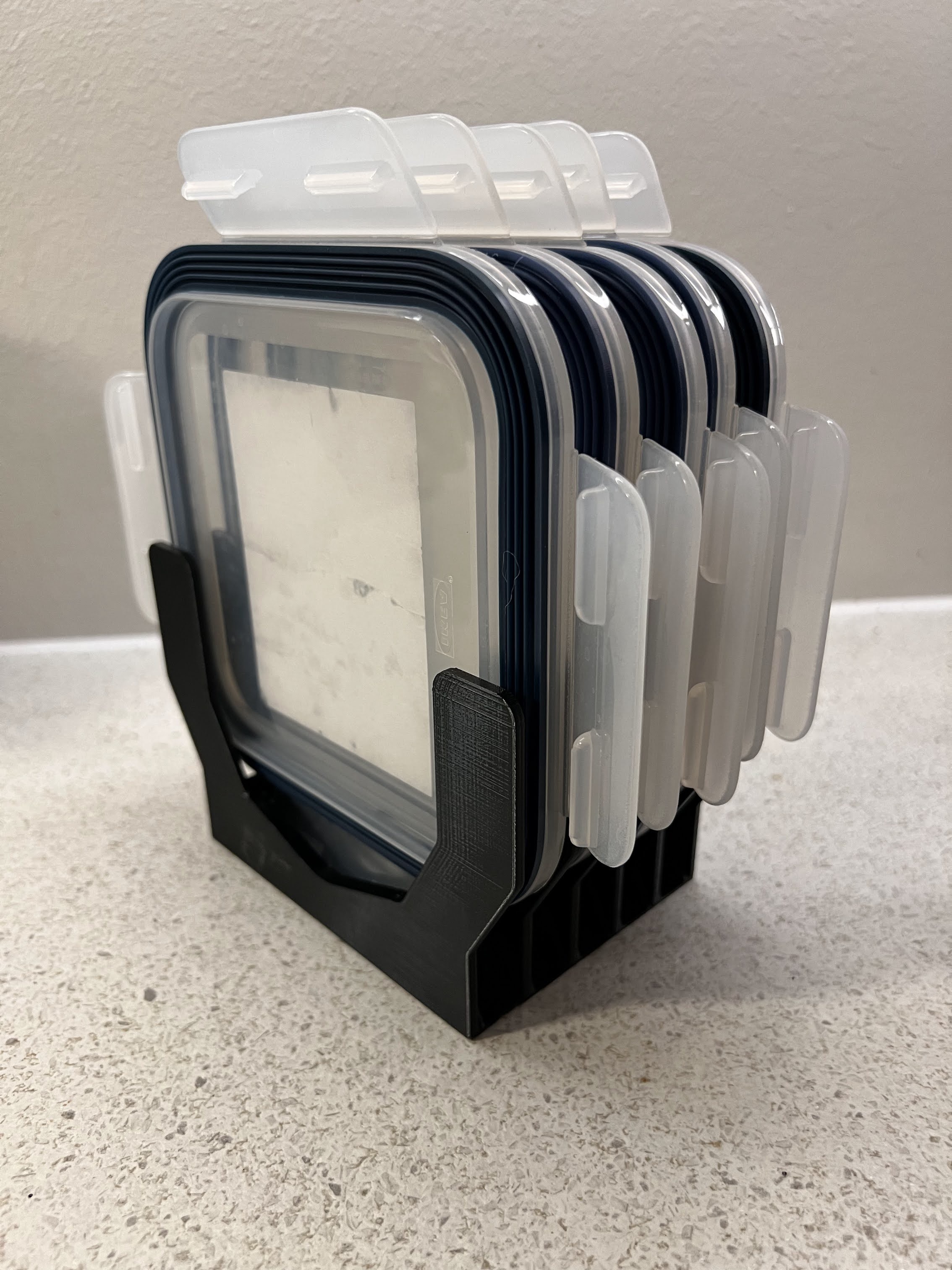 Another view of the IKEA 365 plus lid holder with multiple food container lids