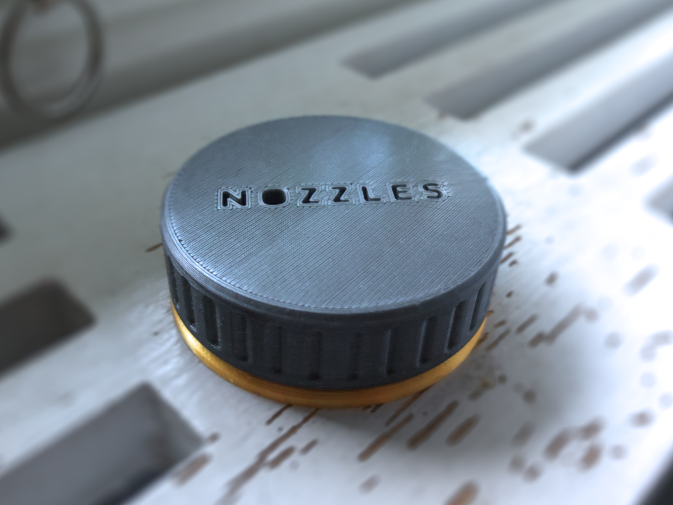 Nozzle case with screwcap
