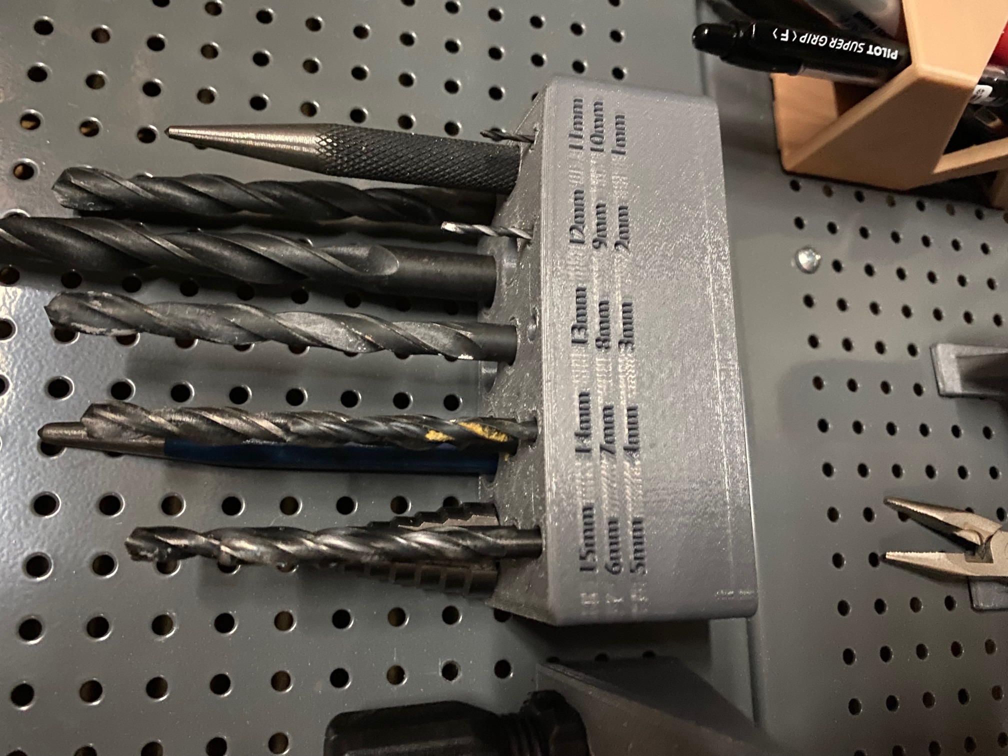 Drill bit holder for pegboard (4mm holes and 12mm spacing) (Biltema) by