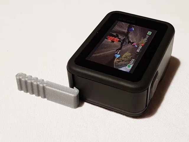 GoPro Hero battery lid opener