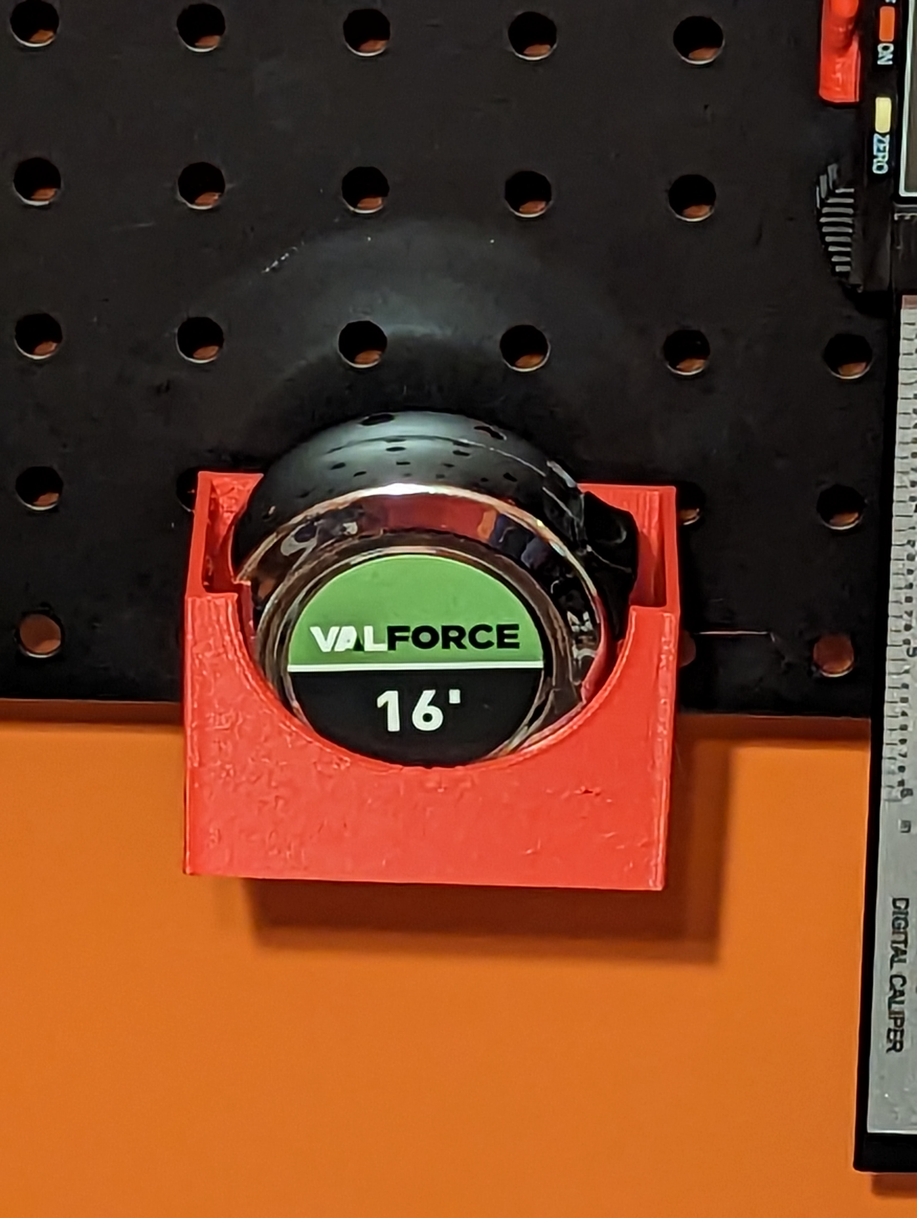Pegboard Tape Measure Holder by Scotty Wofford Download free STL
