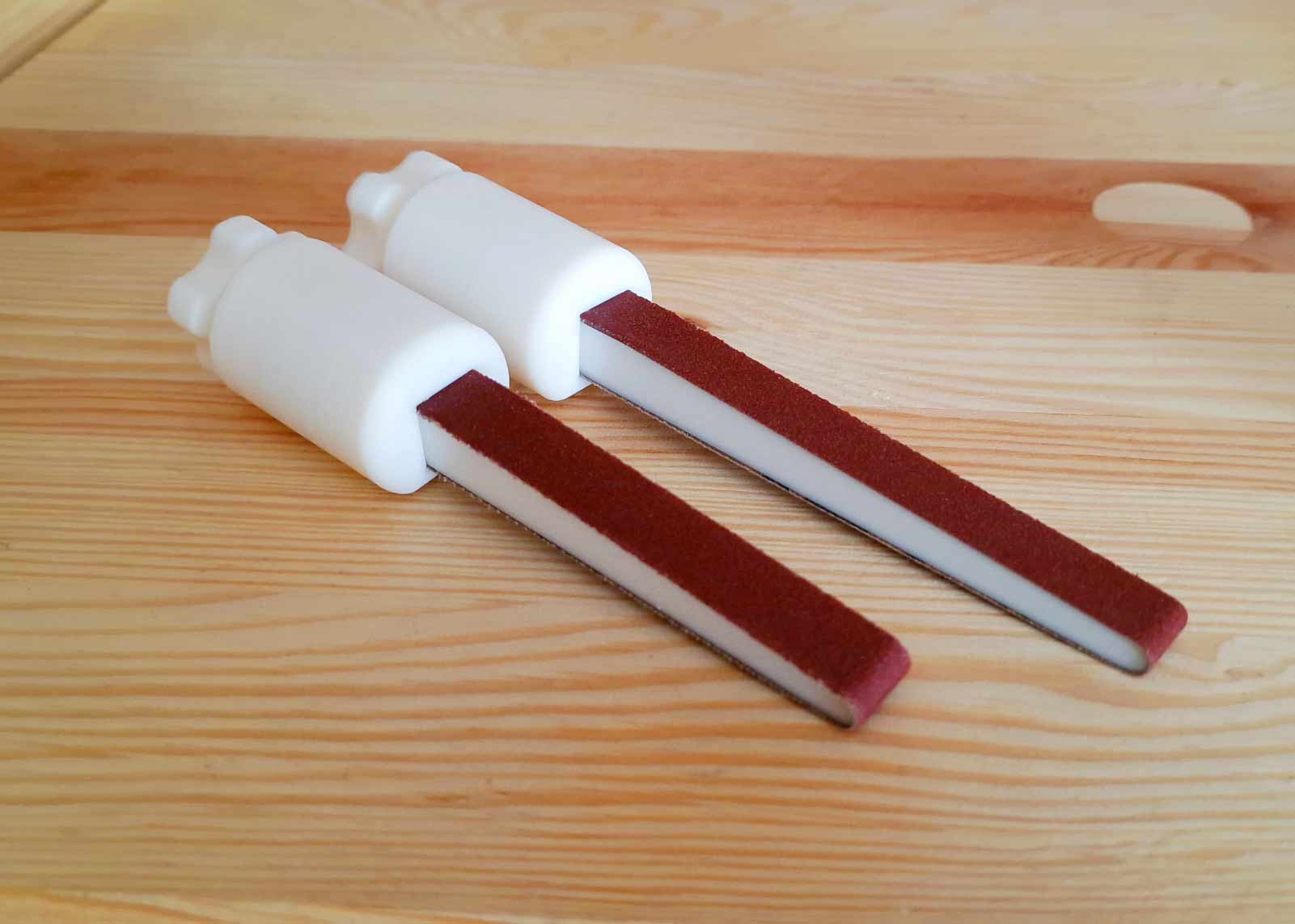 Sandpaper stick with selftightening and clamping in one. by TORX1