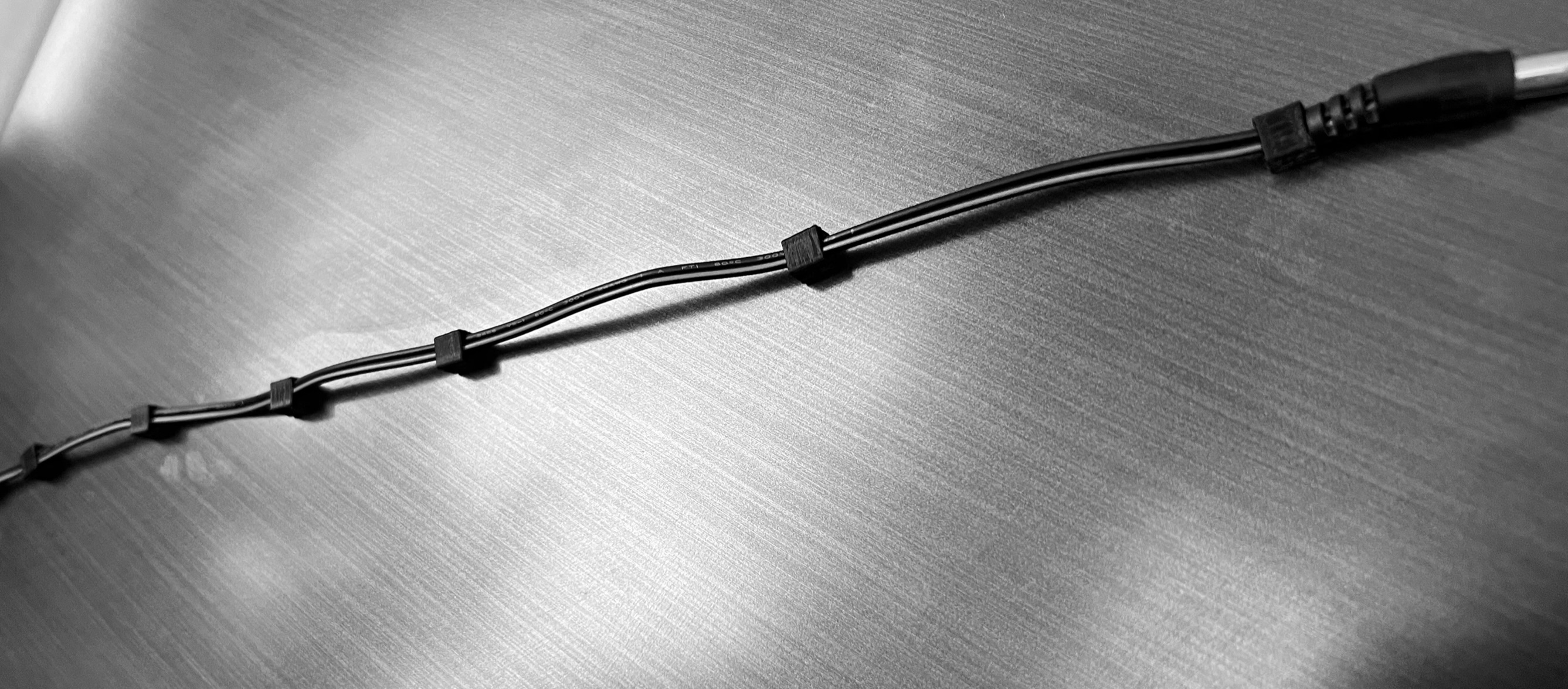 Magnetischer Kabelclip