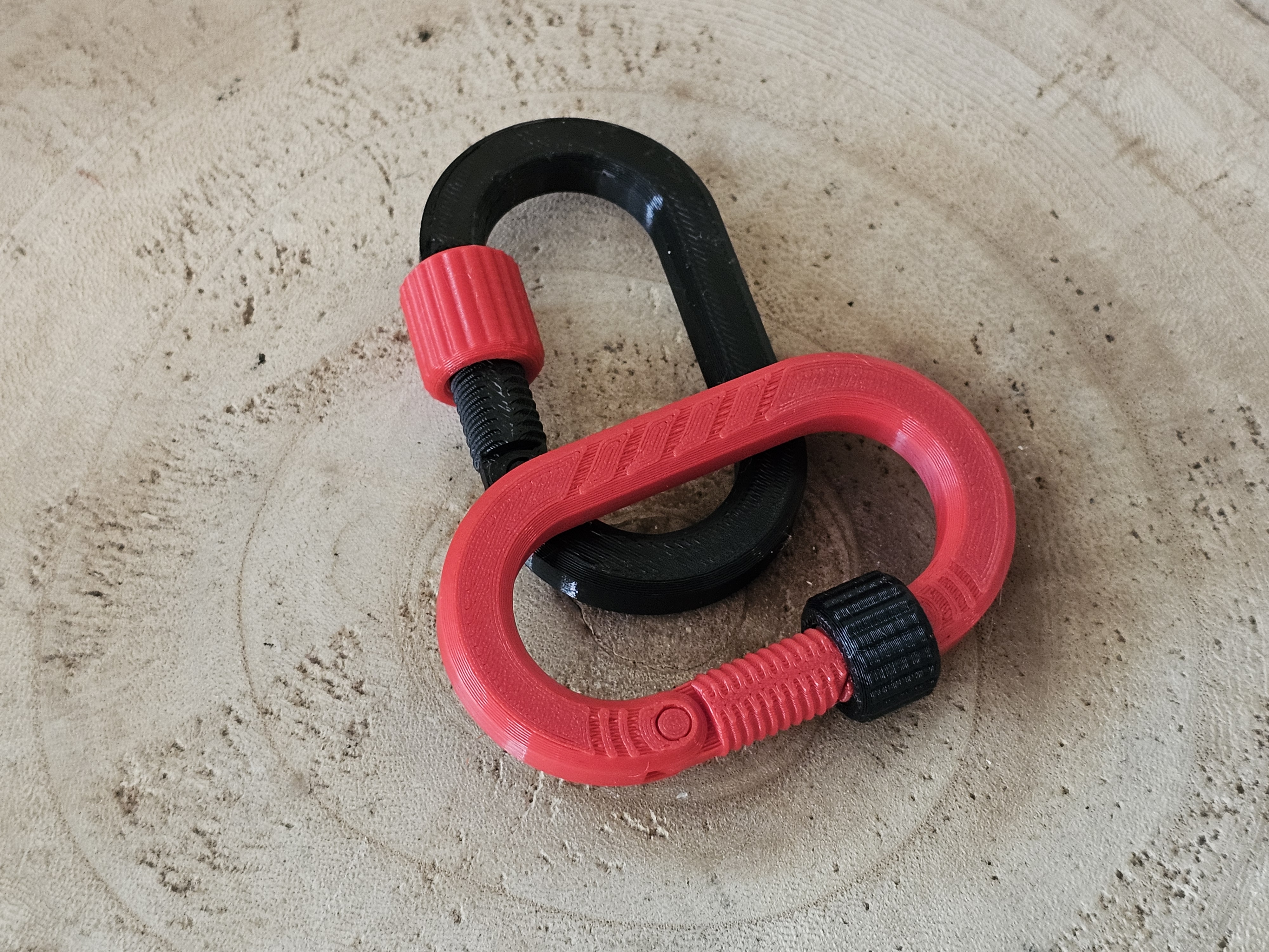 Carabiner with locking nut