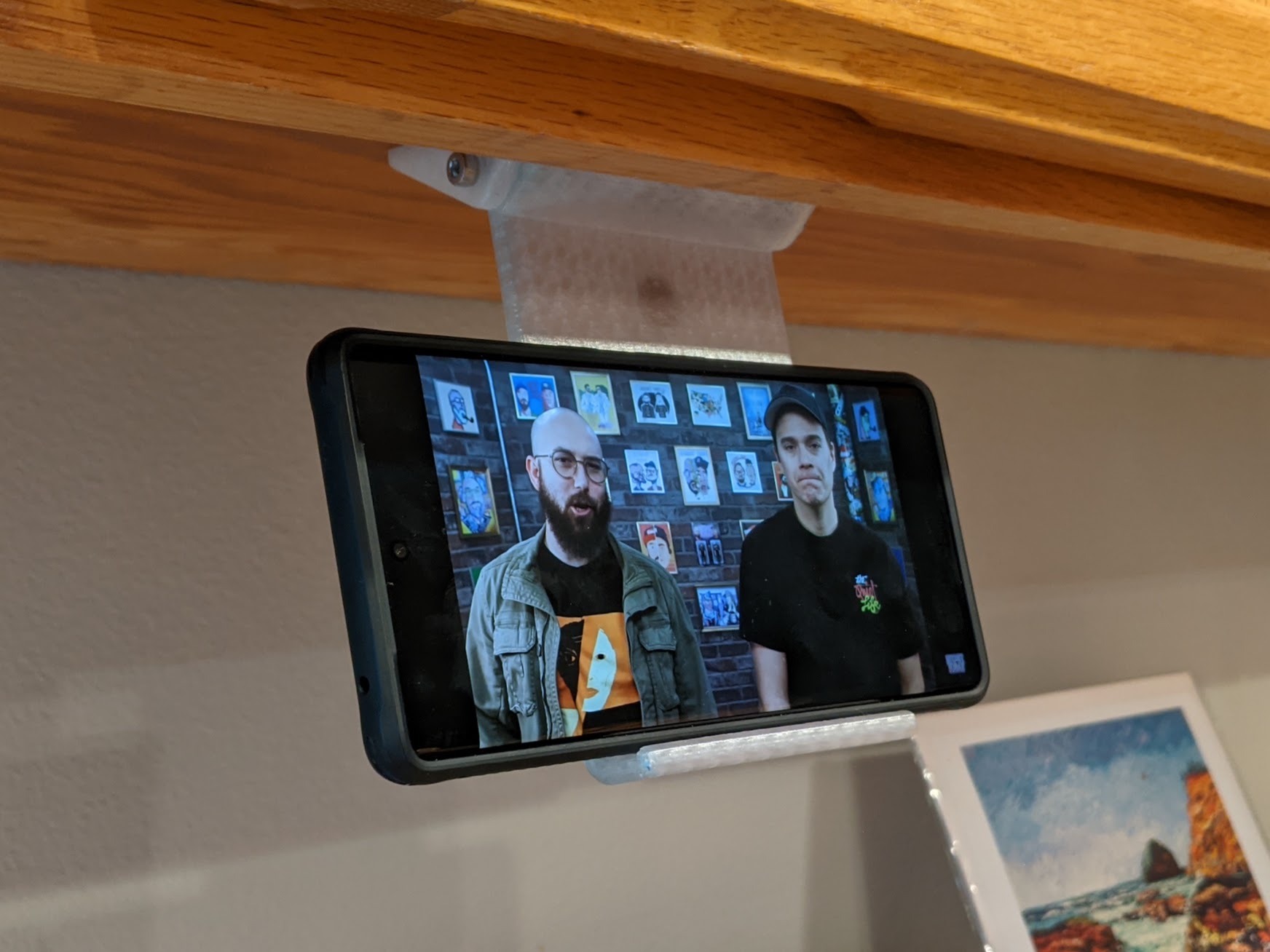 Under Cabinet or Shelf Stowable Phone Holder