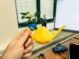 Diamond shaped small watering can