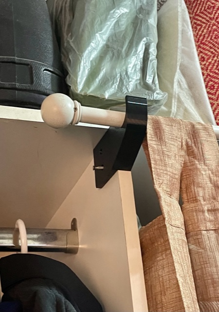 Closet curtain road holder