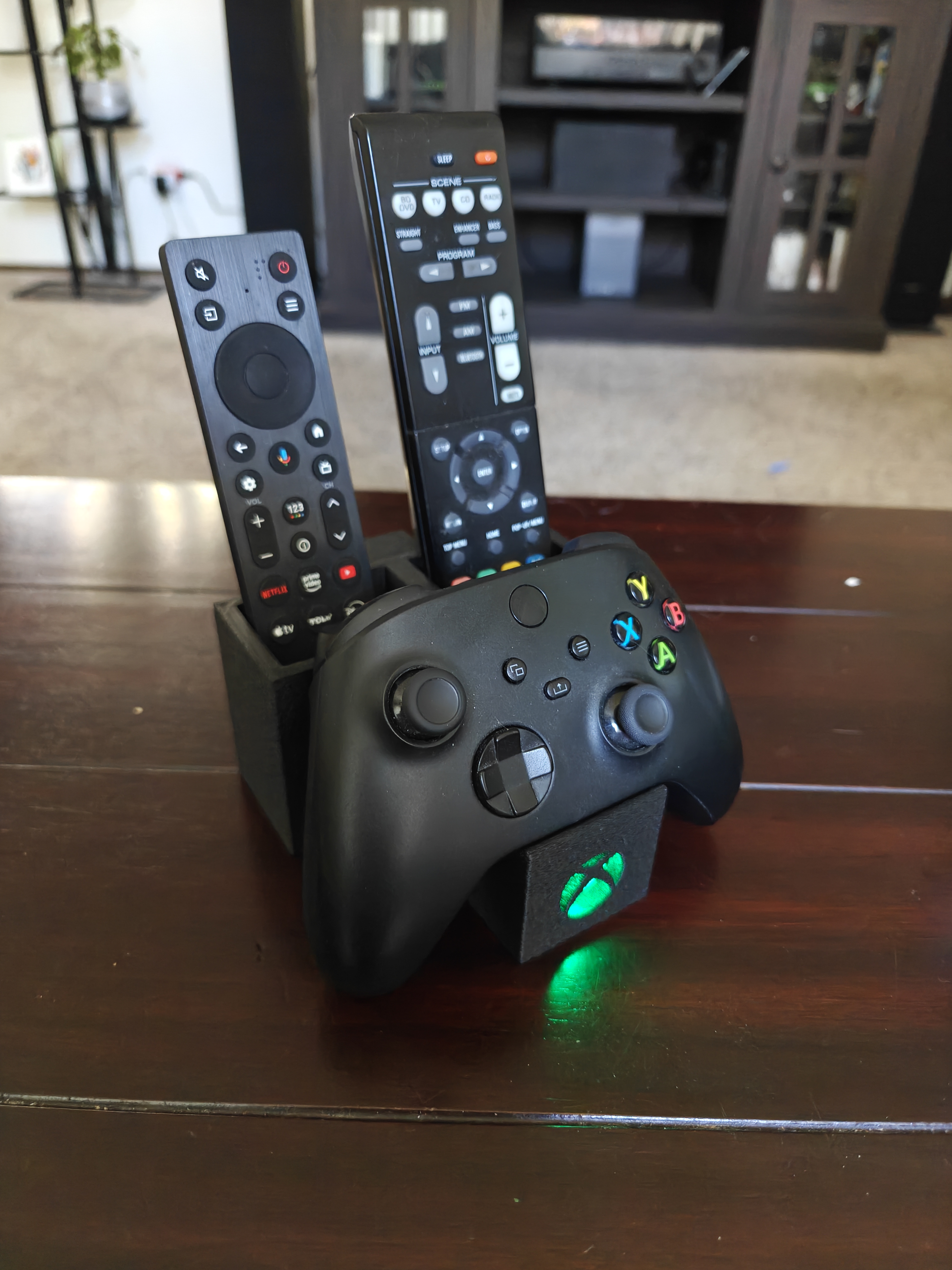 Xbox controller TV and stereo remote stand with backlit logo
