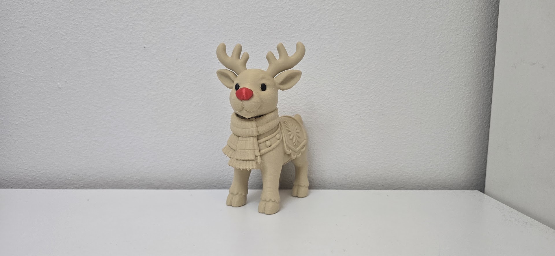 Reindeer with Red Nose and Scarf Christmas Figurine