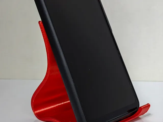 Effortless Viewing: Minimalist Phone Stand with Smart Design