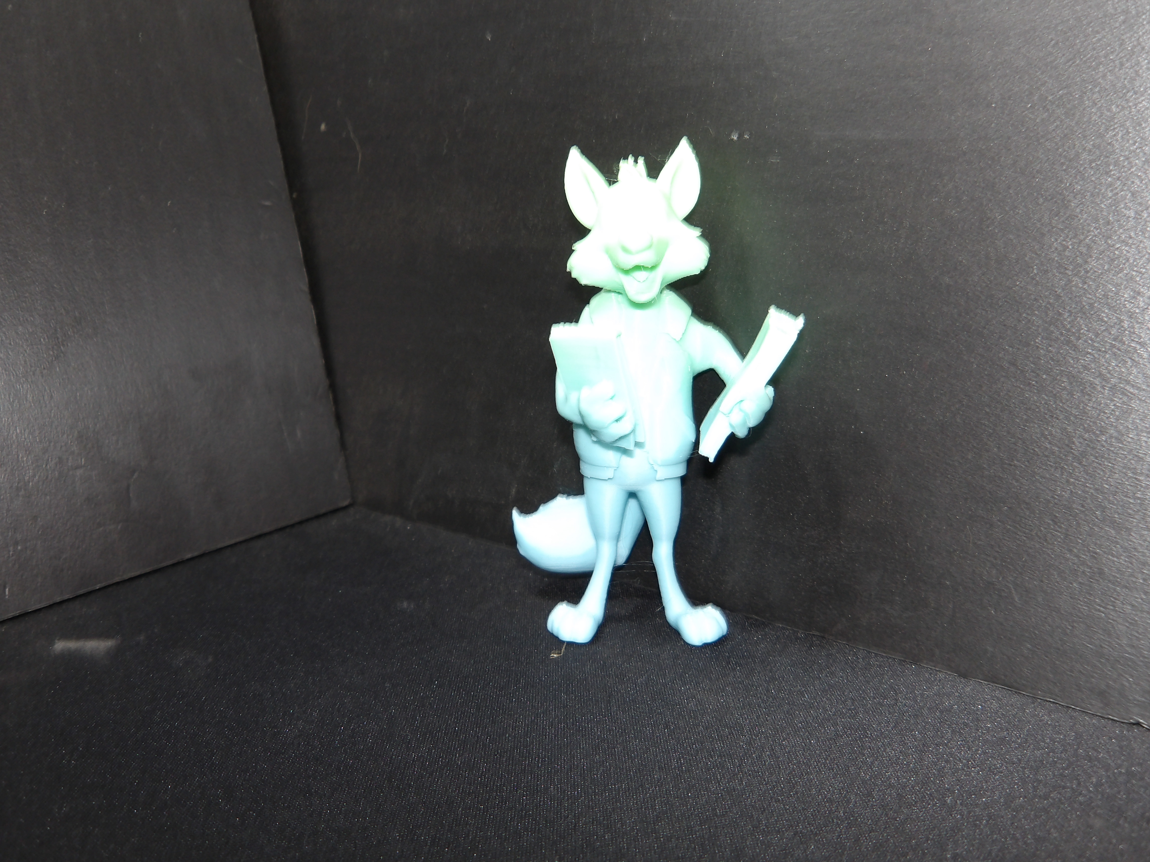 Standing wolf reading a book. — miniatura 4