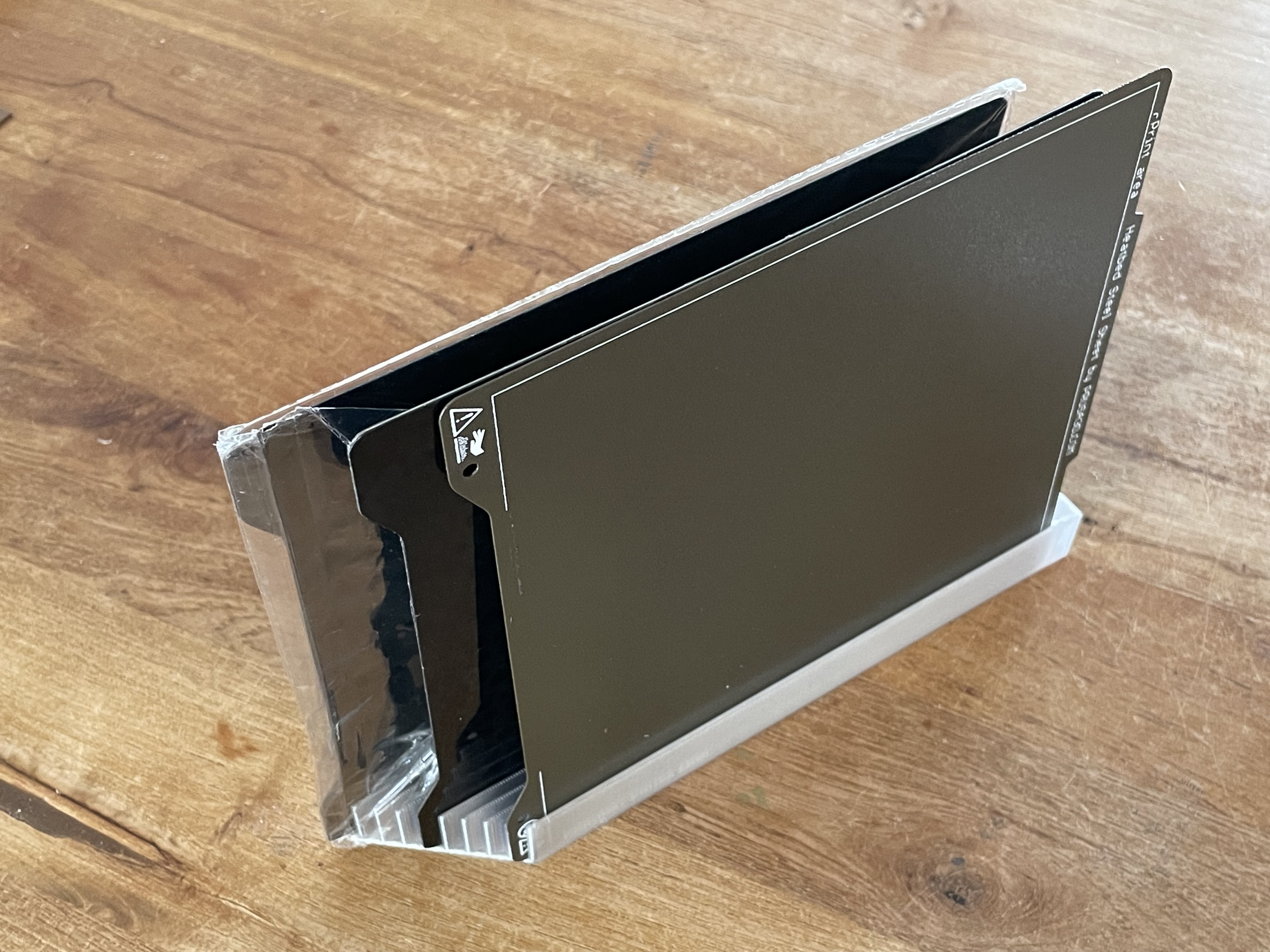 Slim build plate holder for 9 build plates