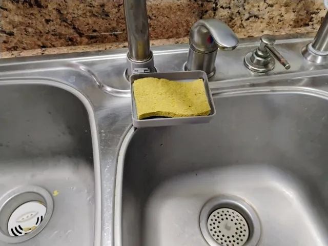 Kitchen sink sponge holder