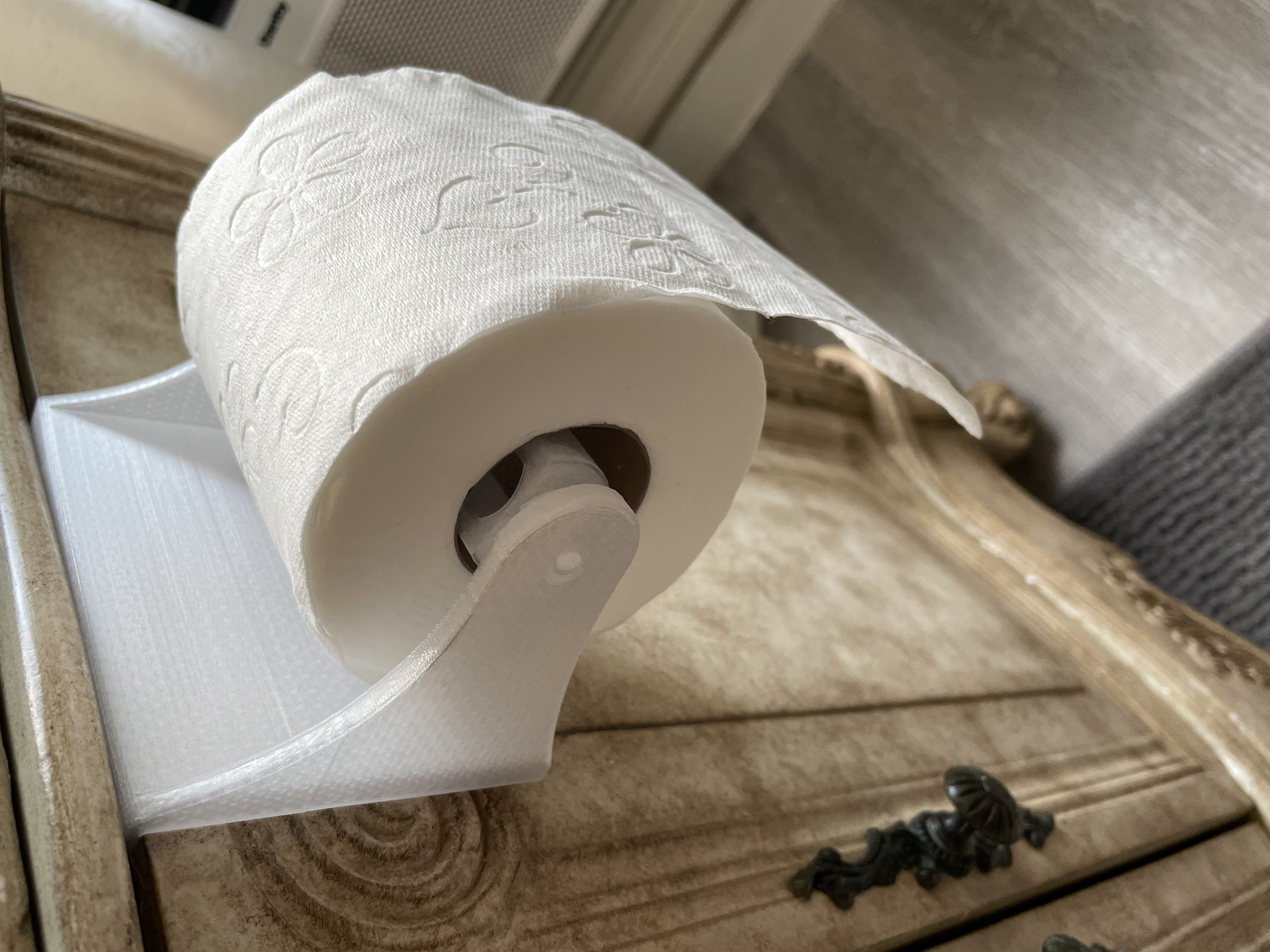 Customizable Toilet Paper holder to fit in bathroom sink cabinet door