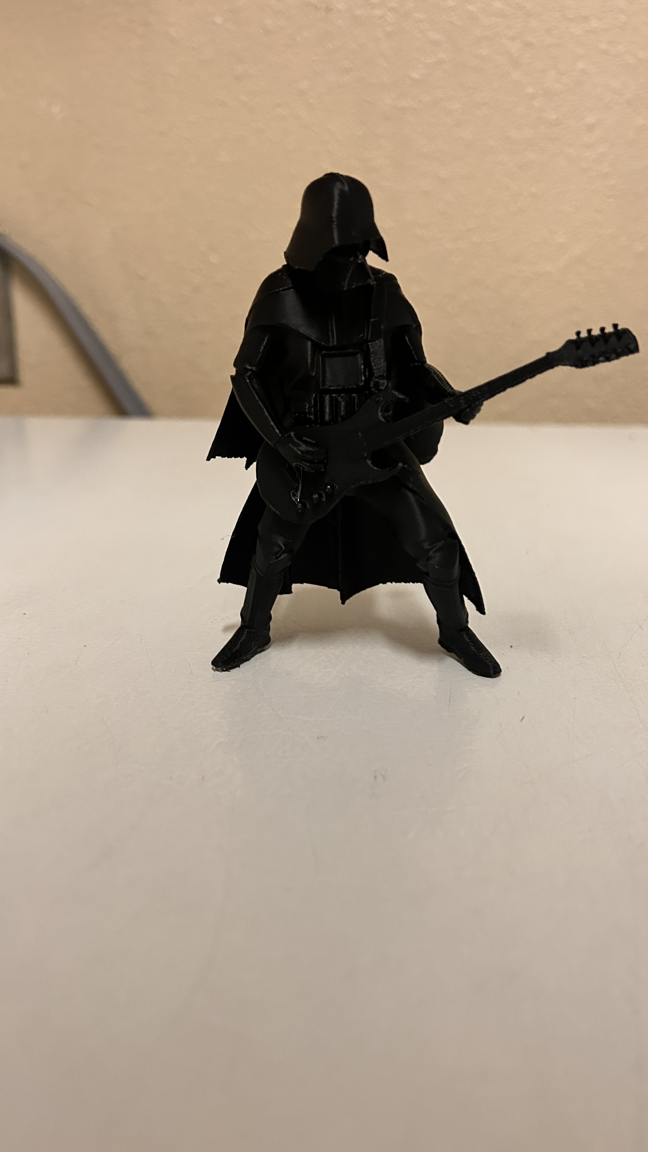 Darth Vader playing a guitar