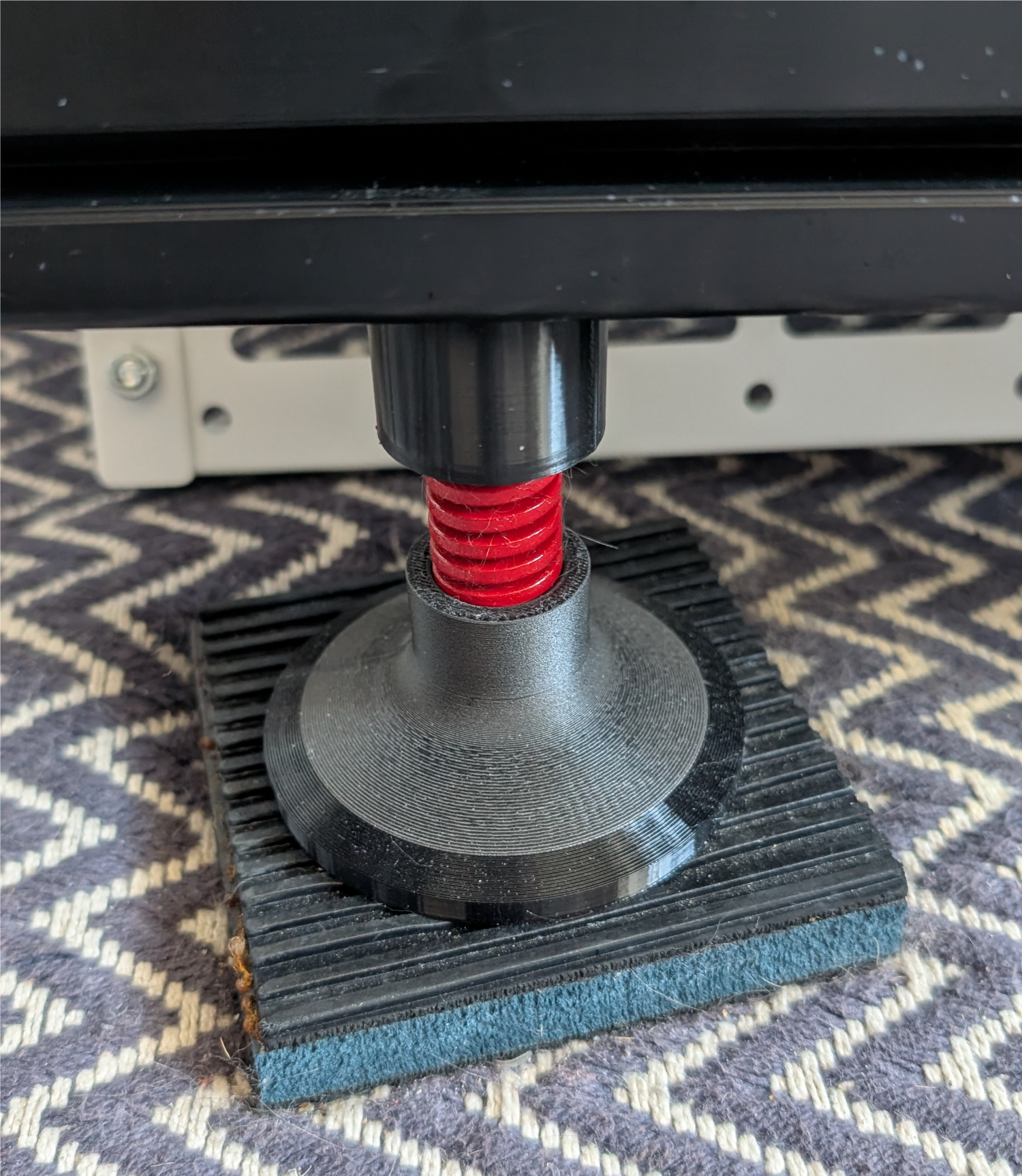 Sim racing vibration isolator