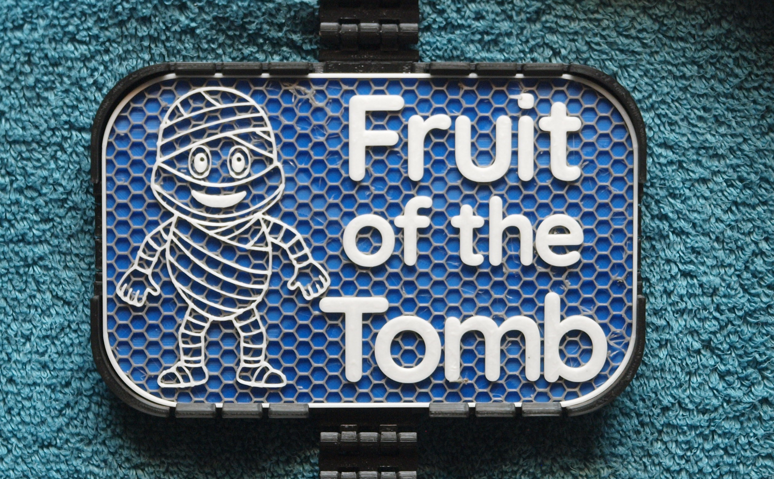 Fruit of the Tomb sign
