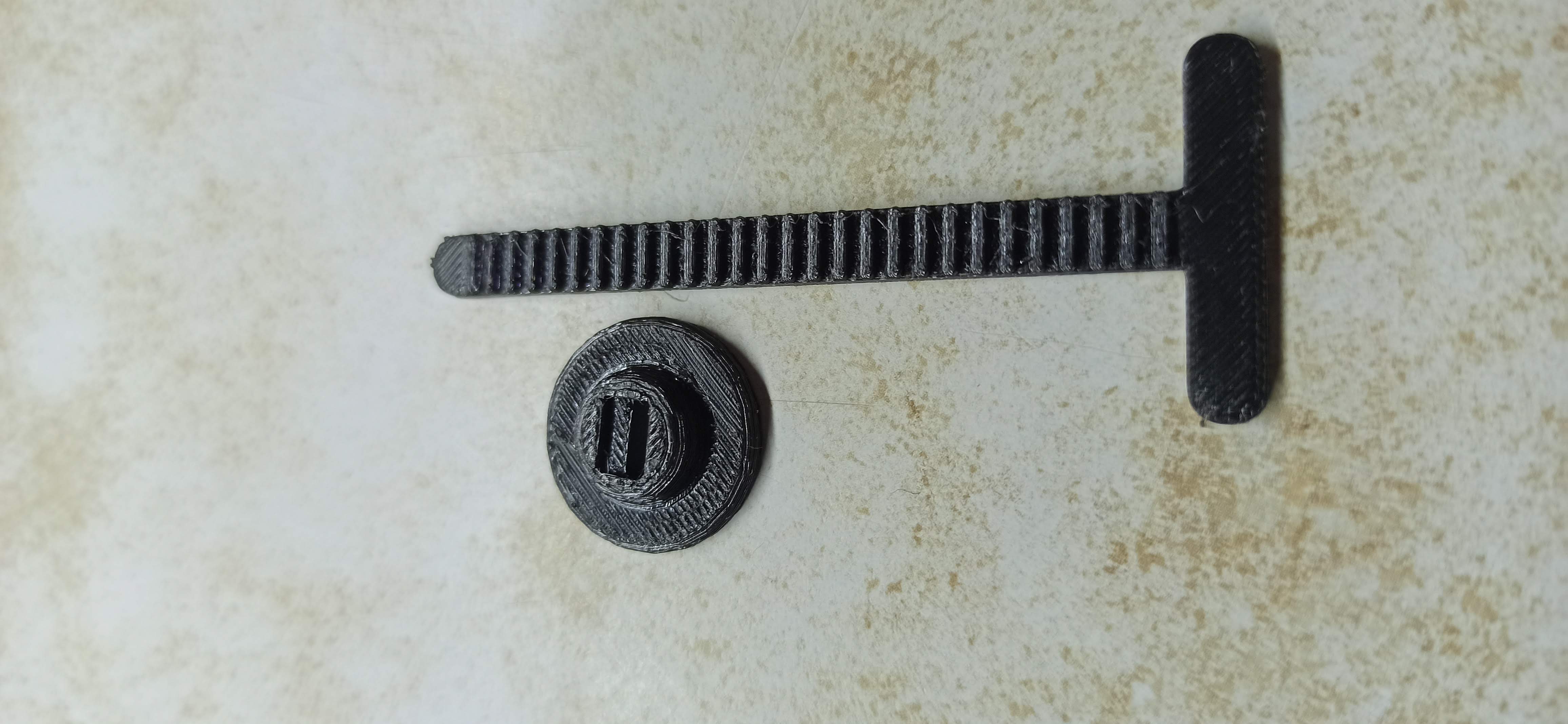 Cable tie with a separate locking device.