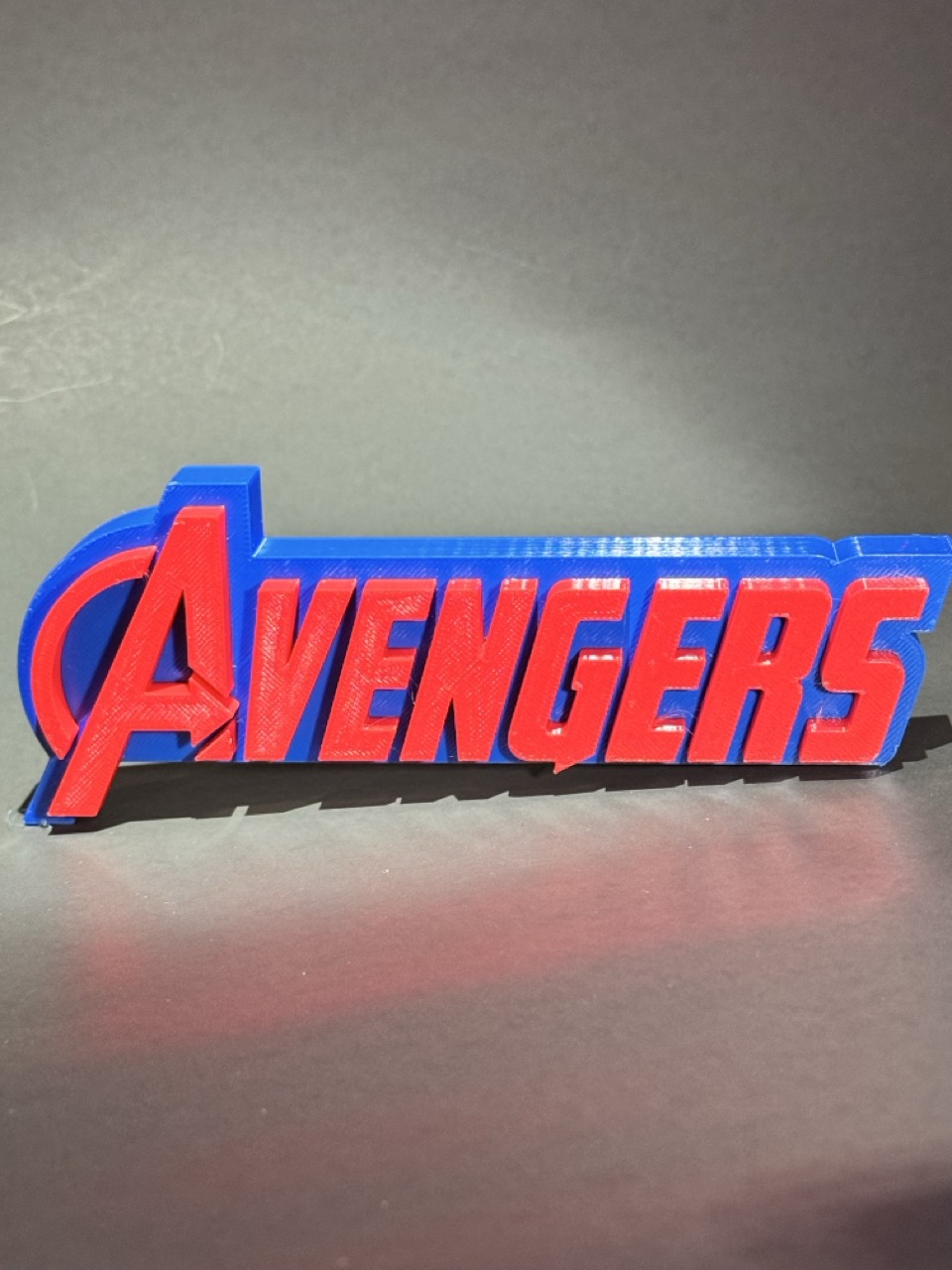 Avengers collectors logo plate
