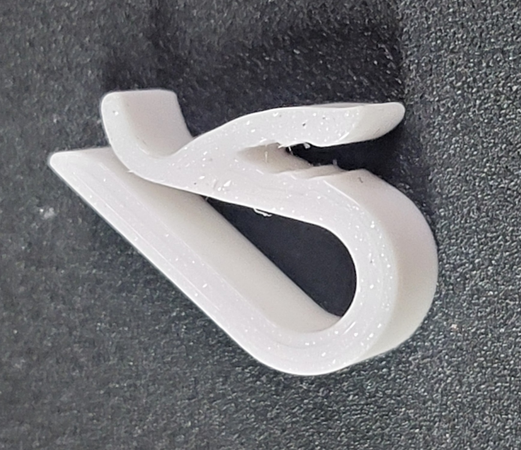 Snug filament clip