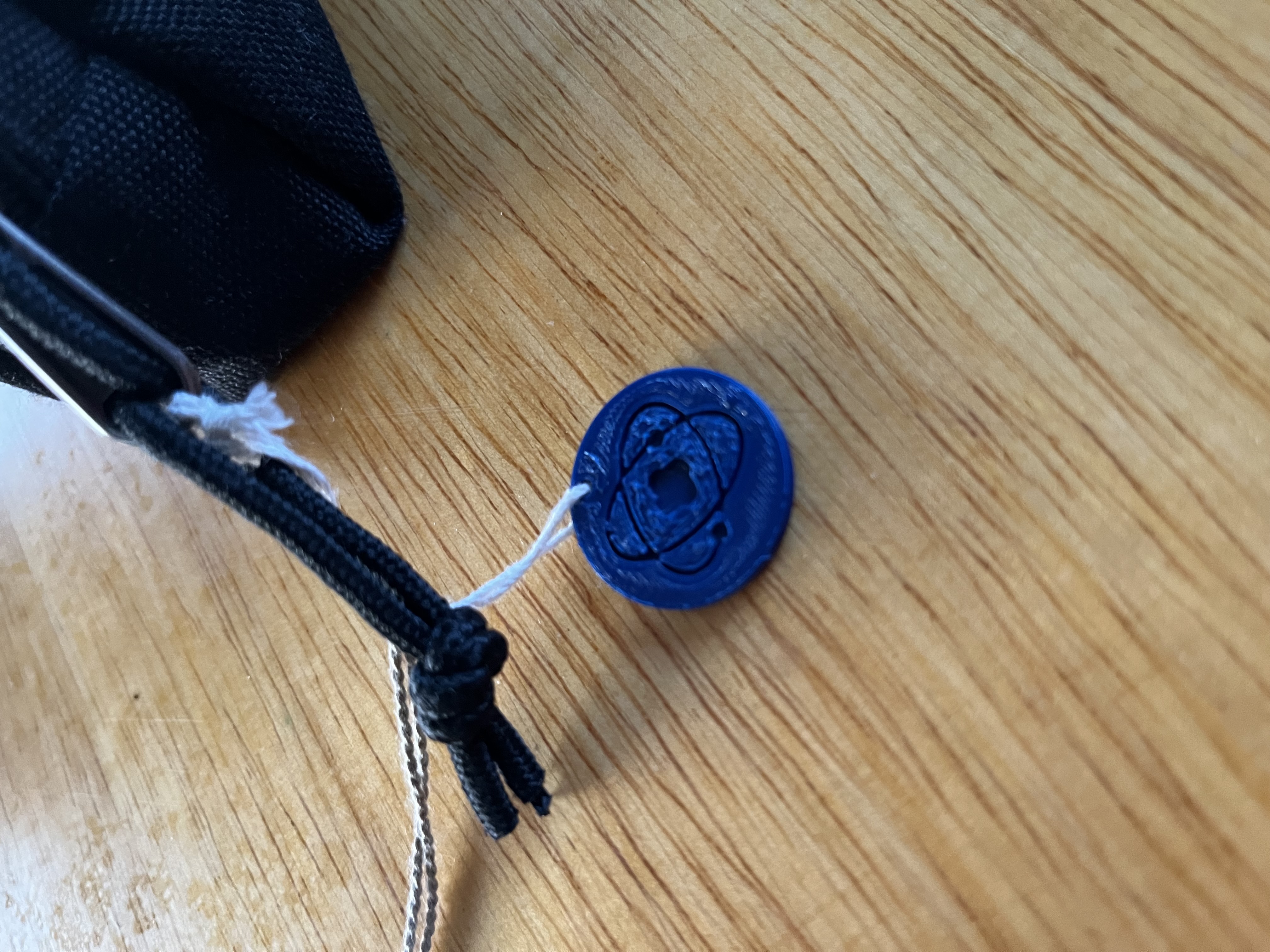 Helium atom keychain