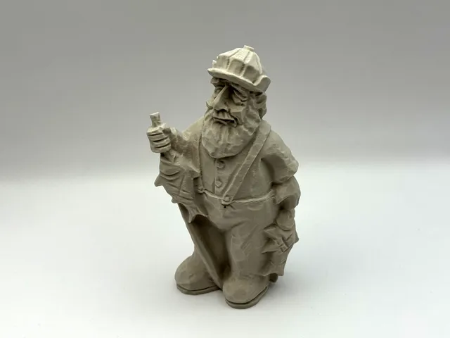 Carved Fisherman Figurine