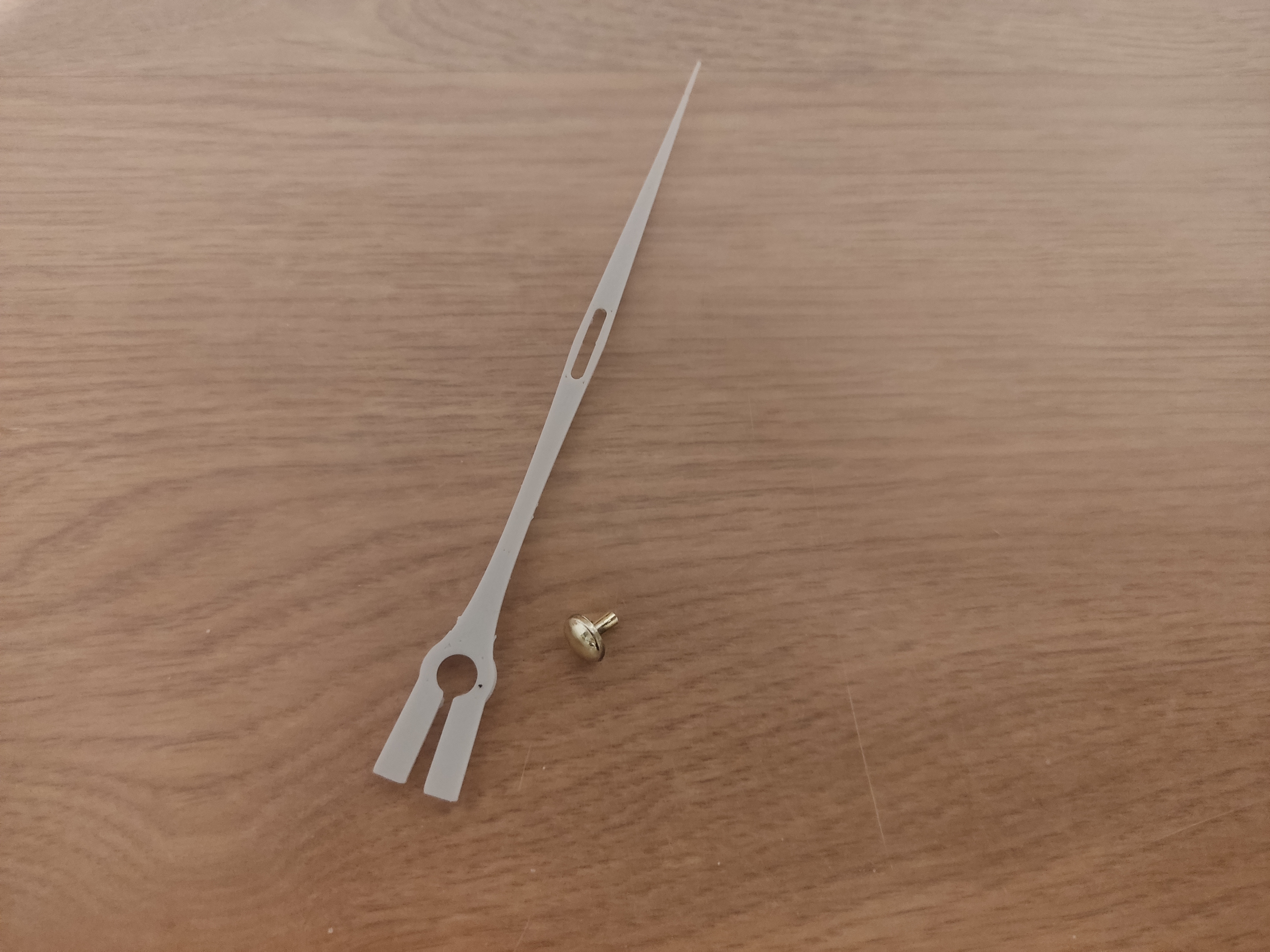 Seconds hand of a wall clock