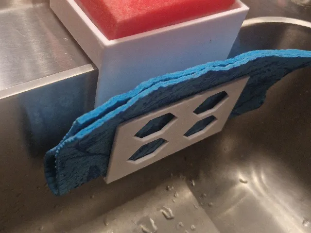 Kitchen sink sponge and dish cloth holder