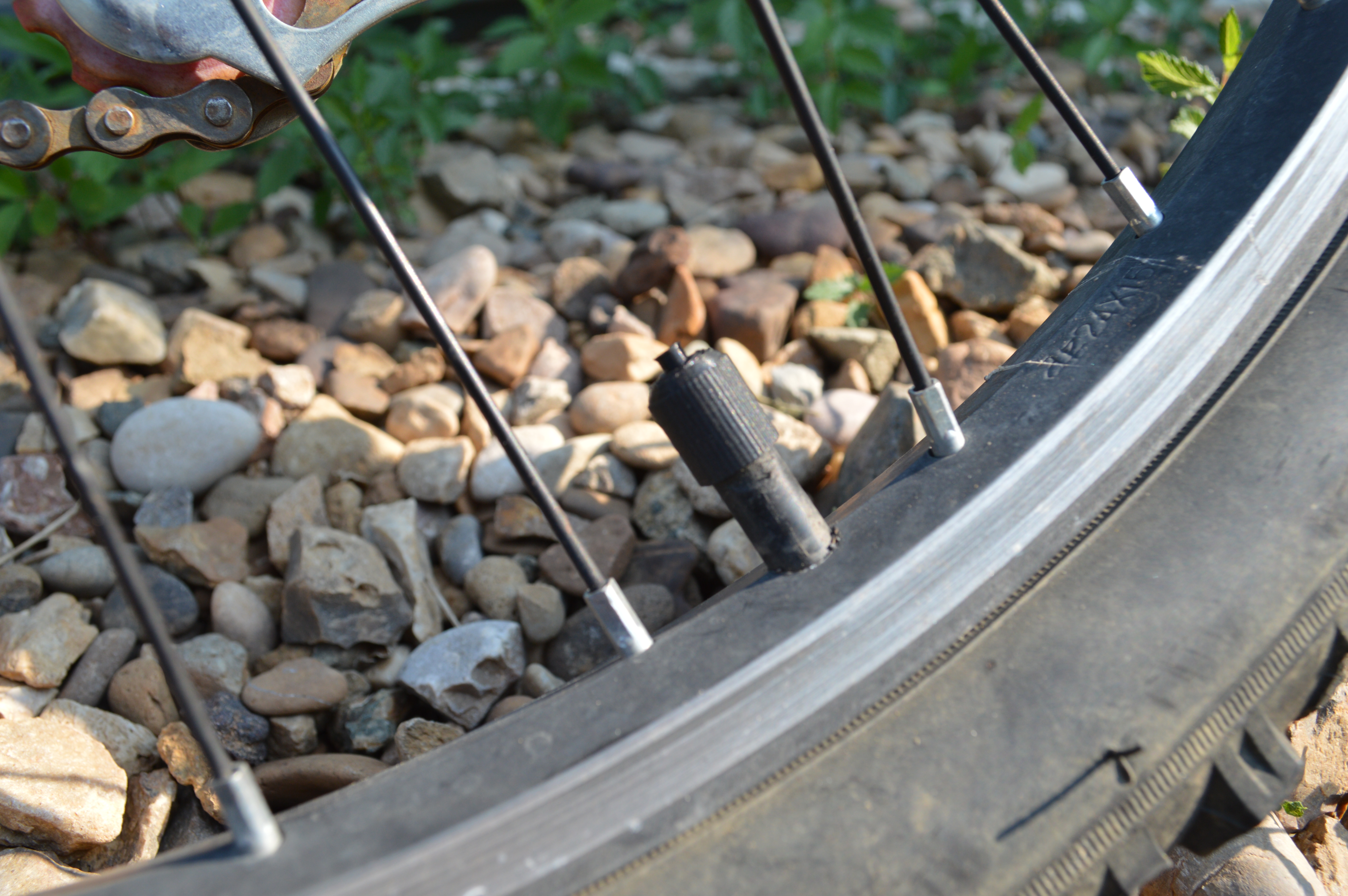 Valve stem cap with print in place air release