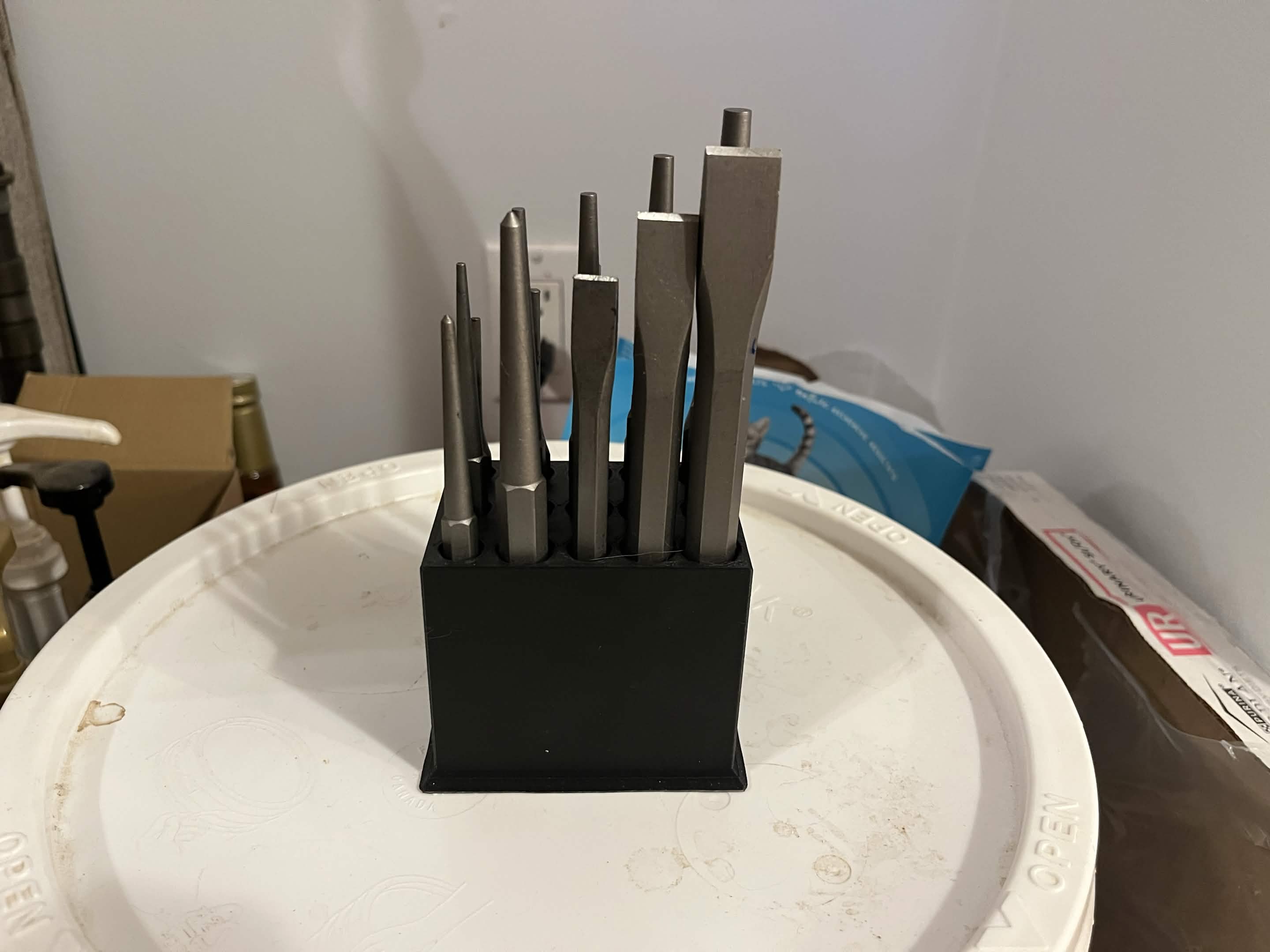 Benchtop holder for POWERFIST 16 piece punch and chisel set  8547713