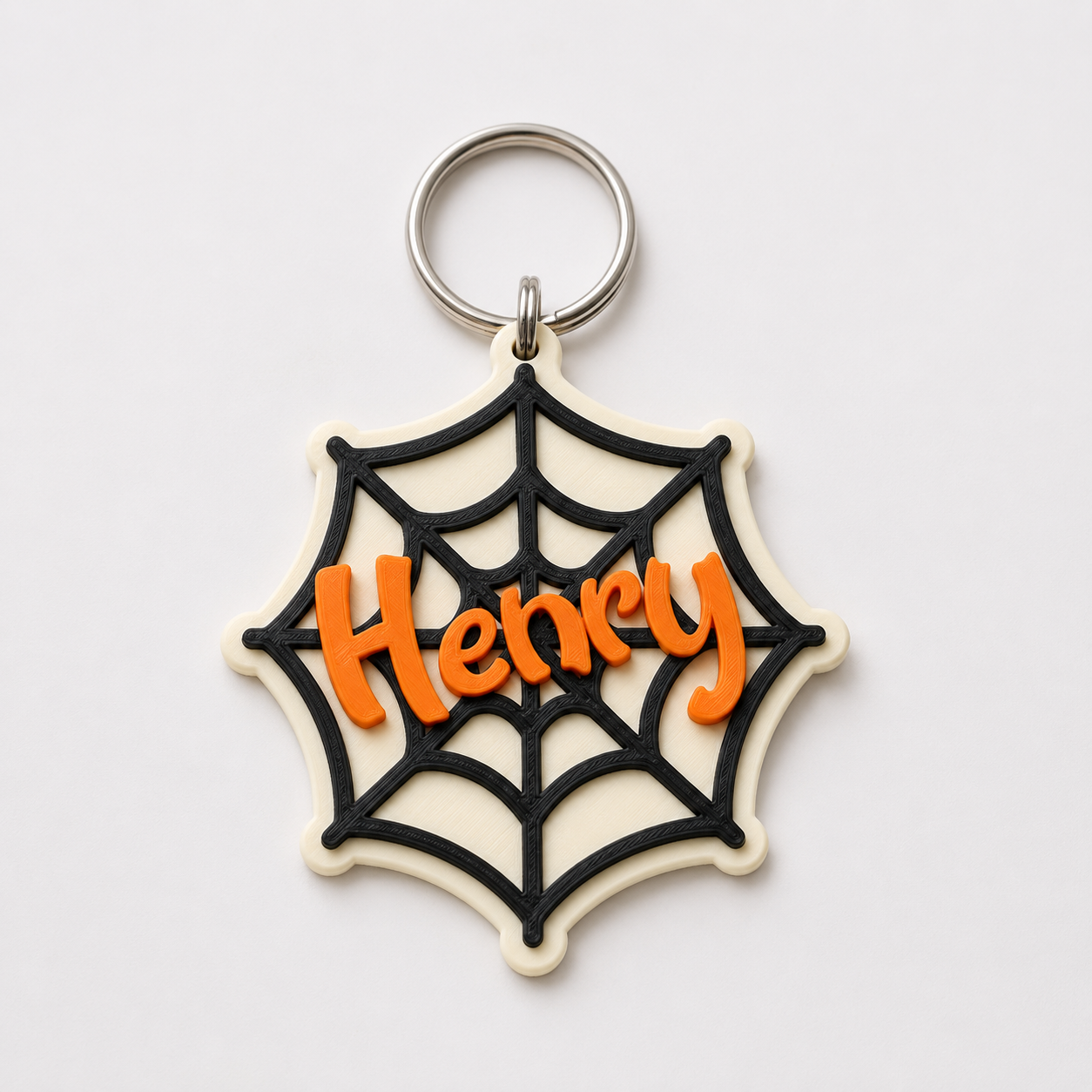 Henry's spider web name tag