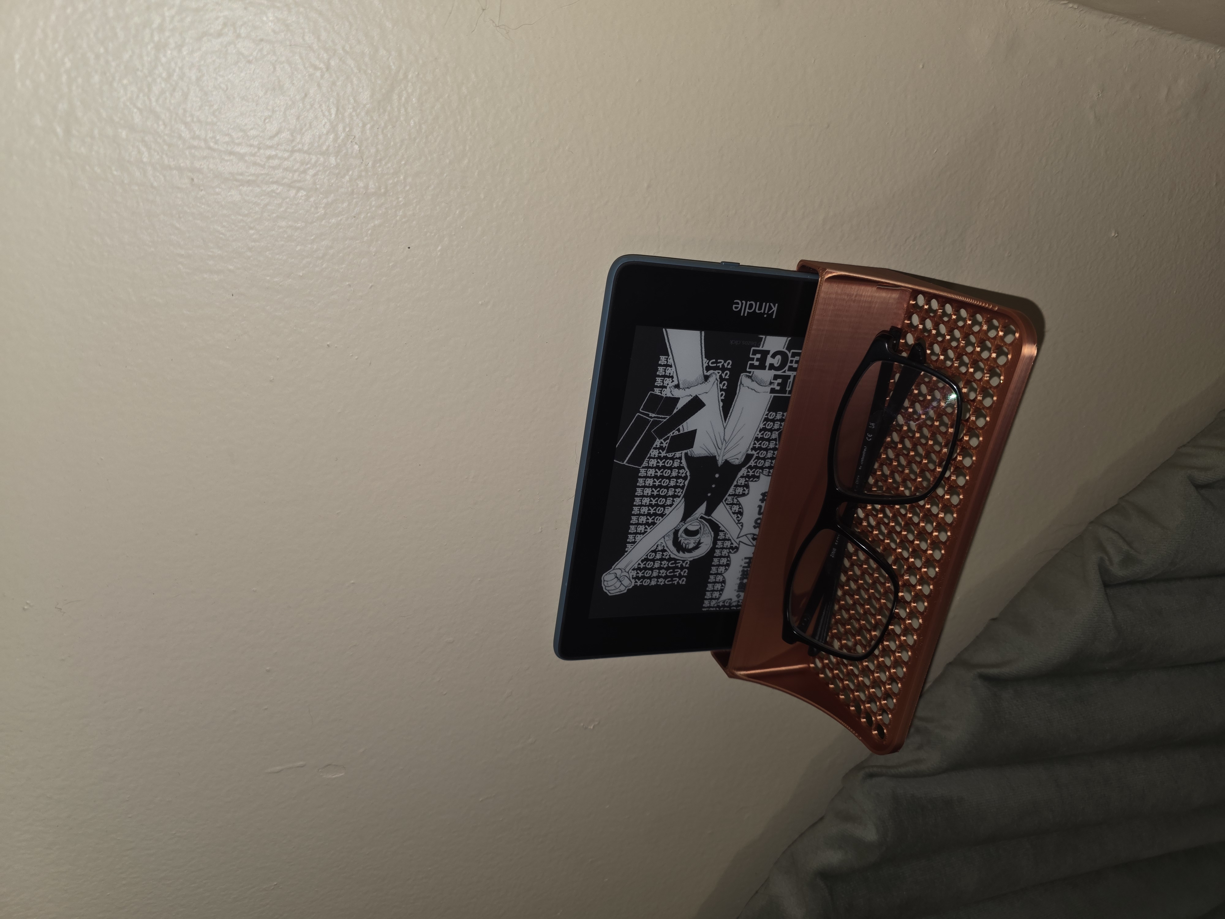 Kindle and glasses wall shelf