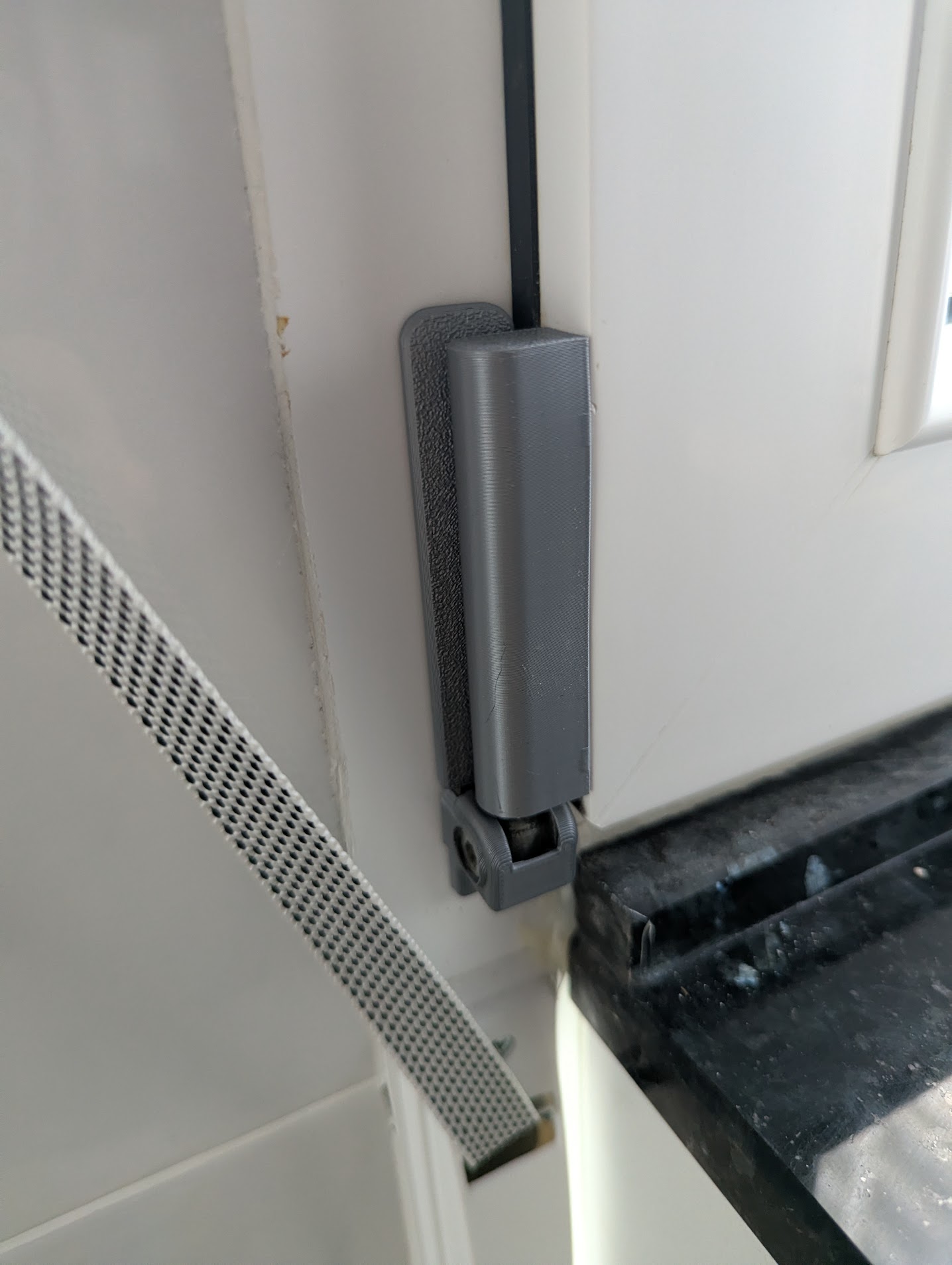 Bottom hinge cover for VHS brand PVC windows