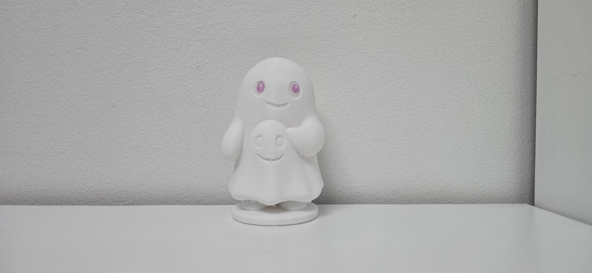 Friendly Ghost Holding Mini Ghost Figure