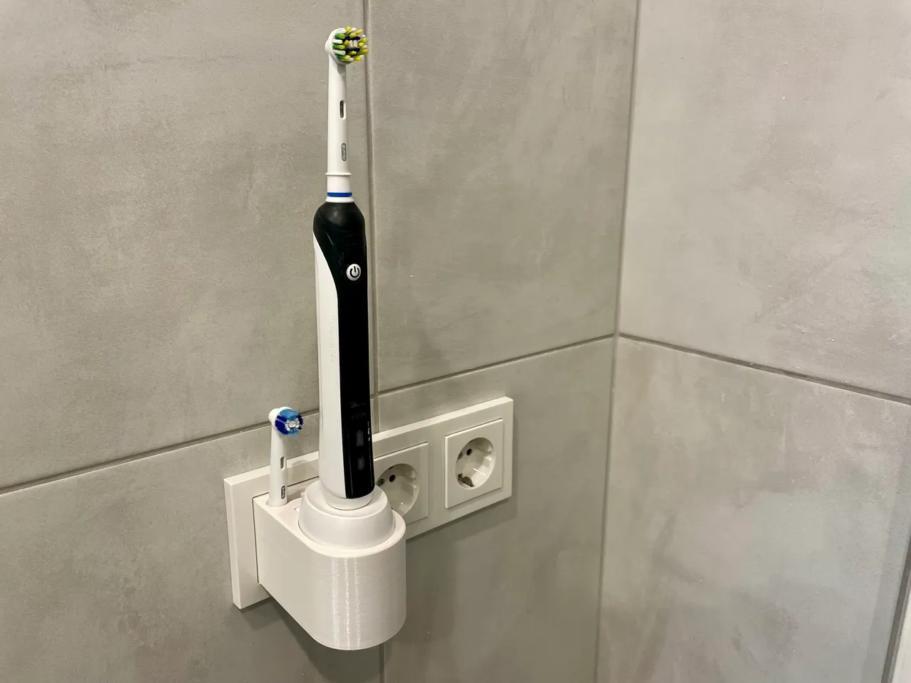 Minimalist Oral-B Braun Electric Toothbrush Wall Mount by András Bognár, Download free STL model