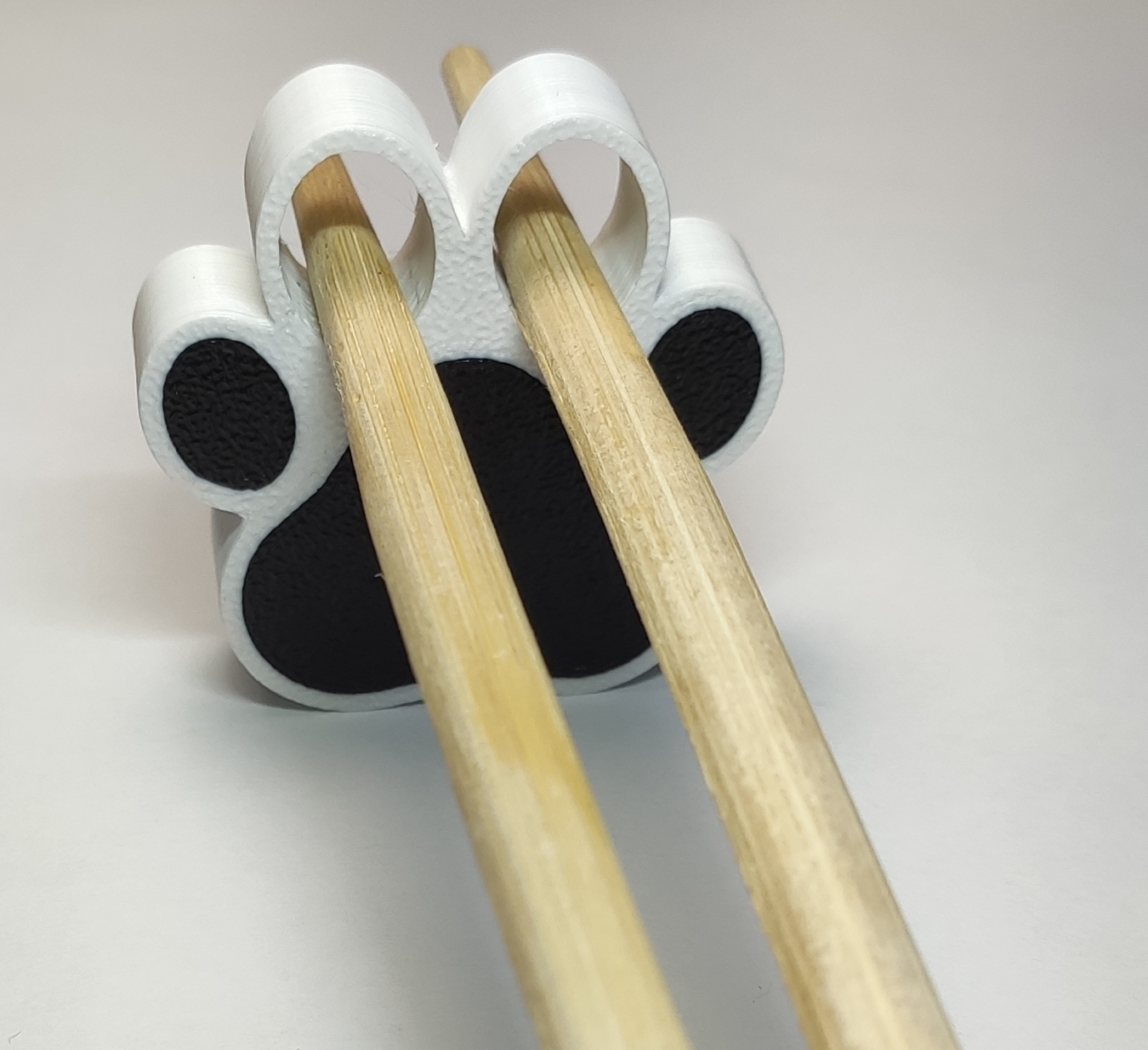 Dog footprint chopstick holder