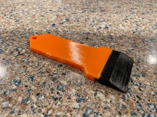 Scraper with solid handle & removable rubber handle
