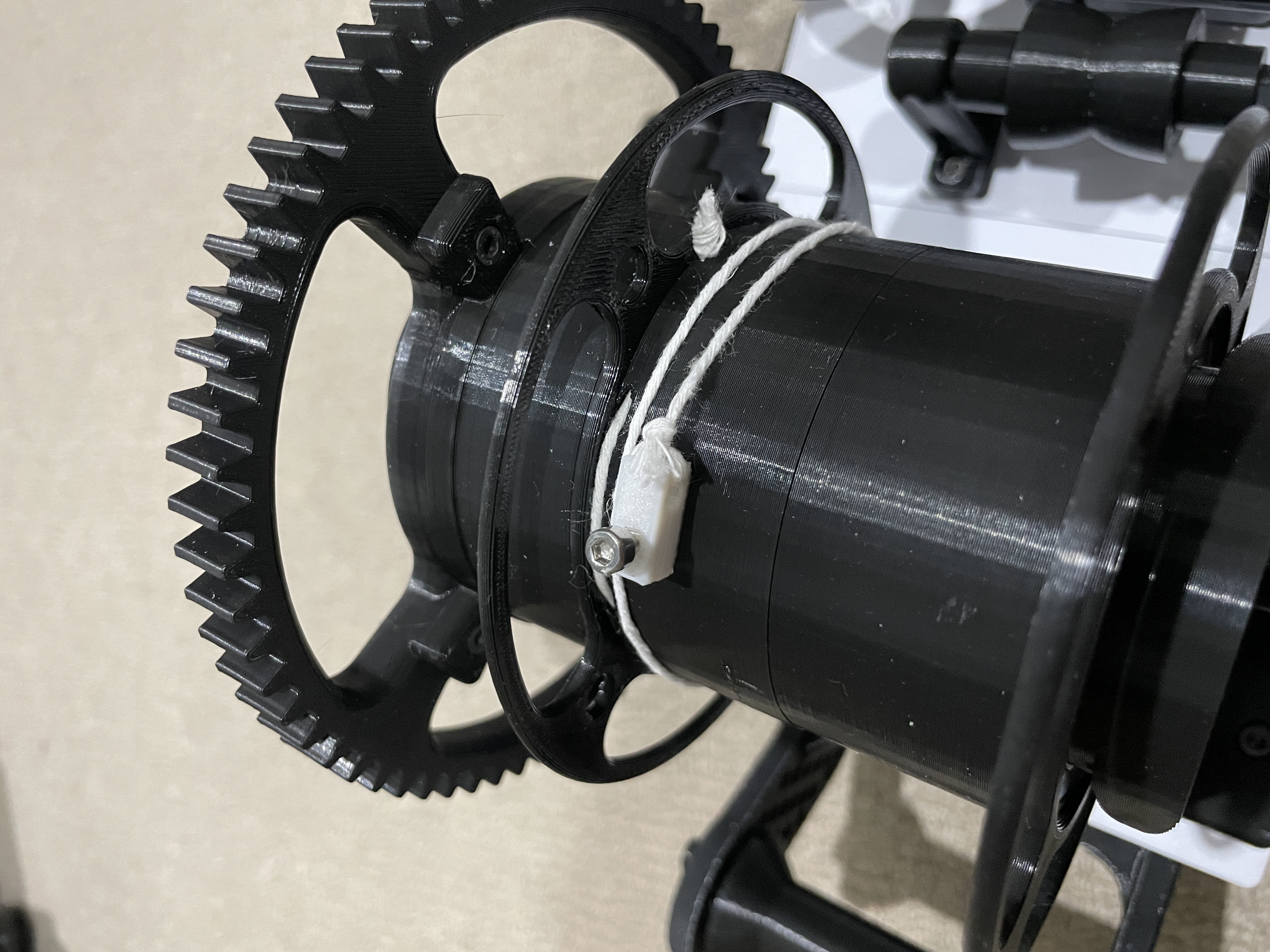 Miniatura 2 do modelo 3D PET Machine Filament to String Attachment