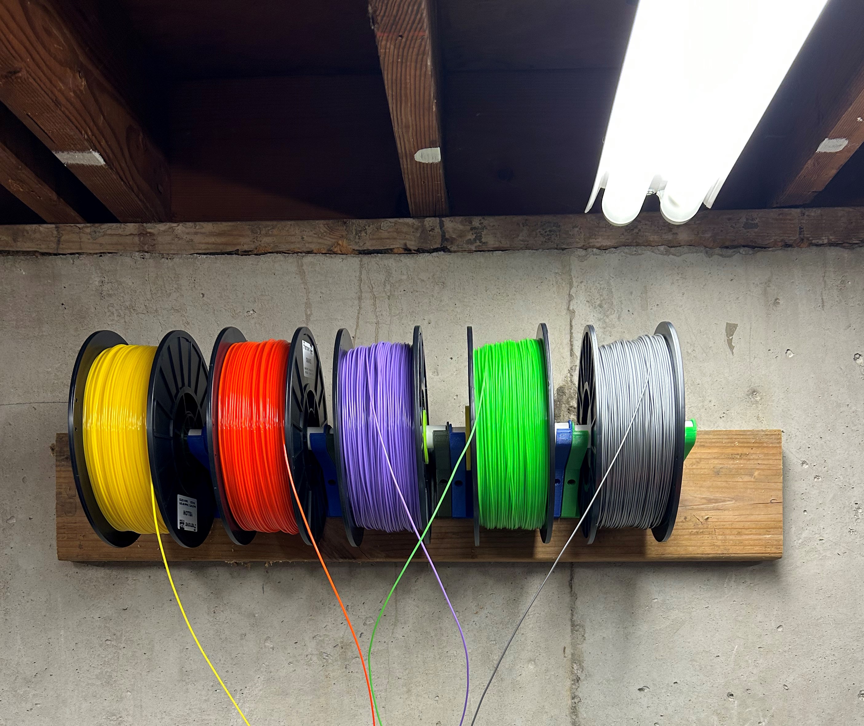 Wall hanging spool holder using PVC shaft by Chris Riley Download free STL model