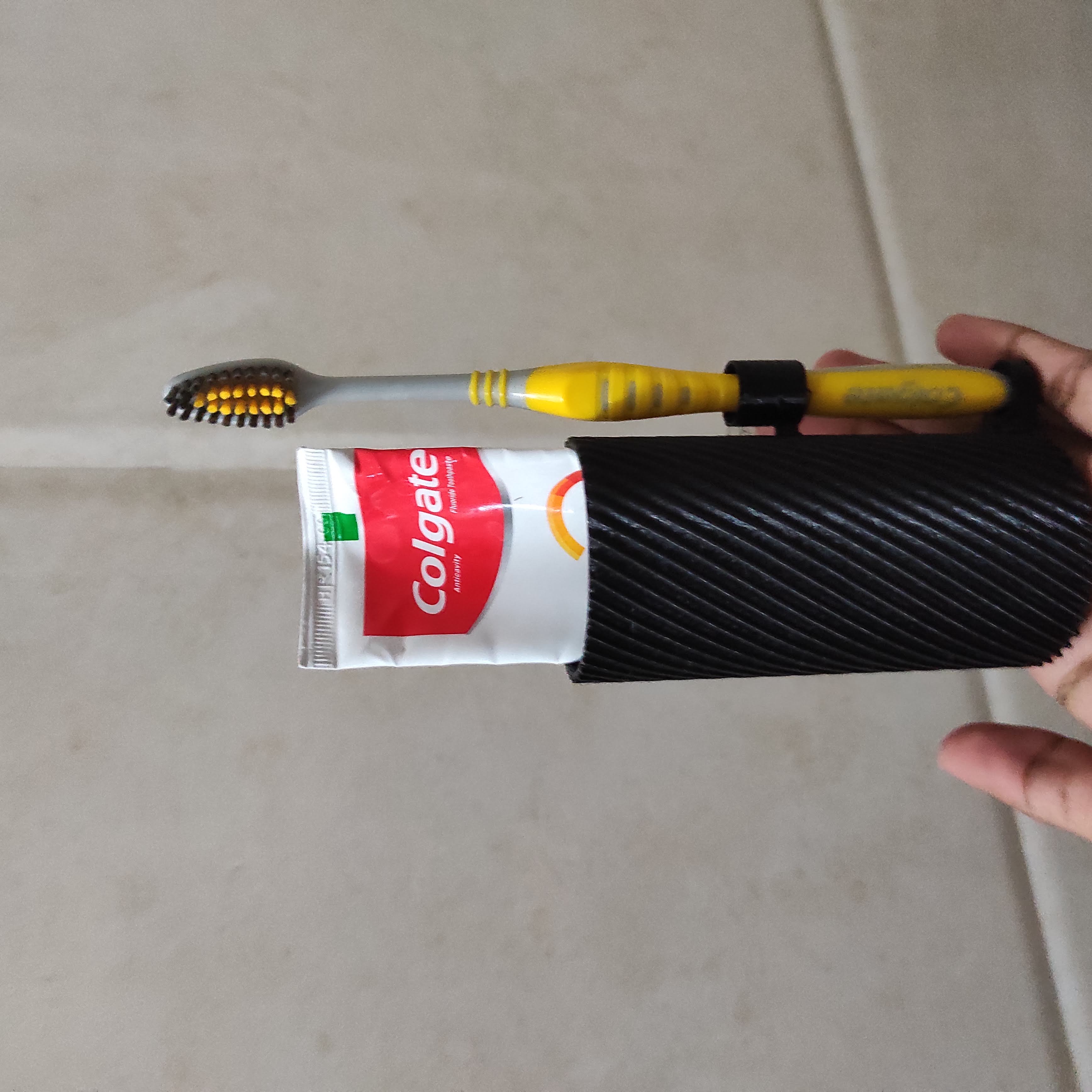 Tooth brush and paste holder