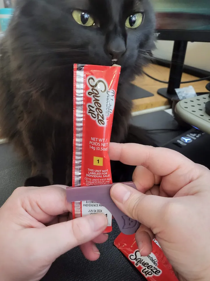 Cat food in top squeeze tube