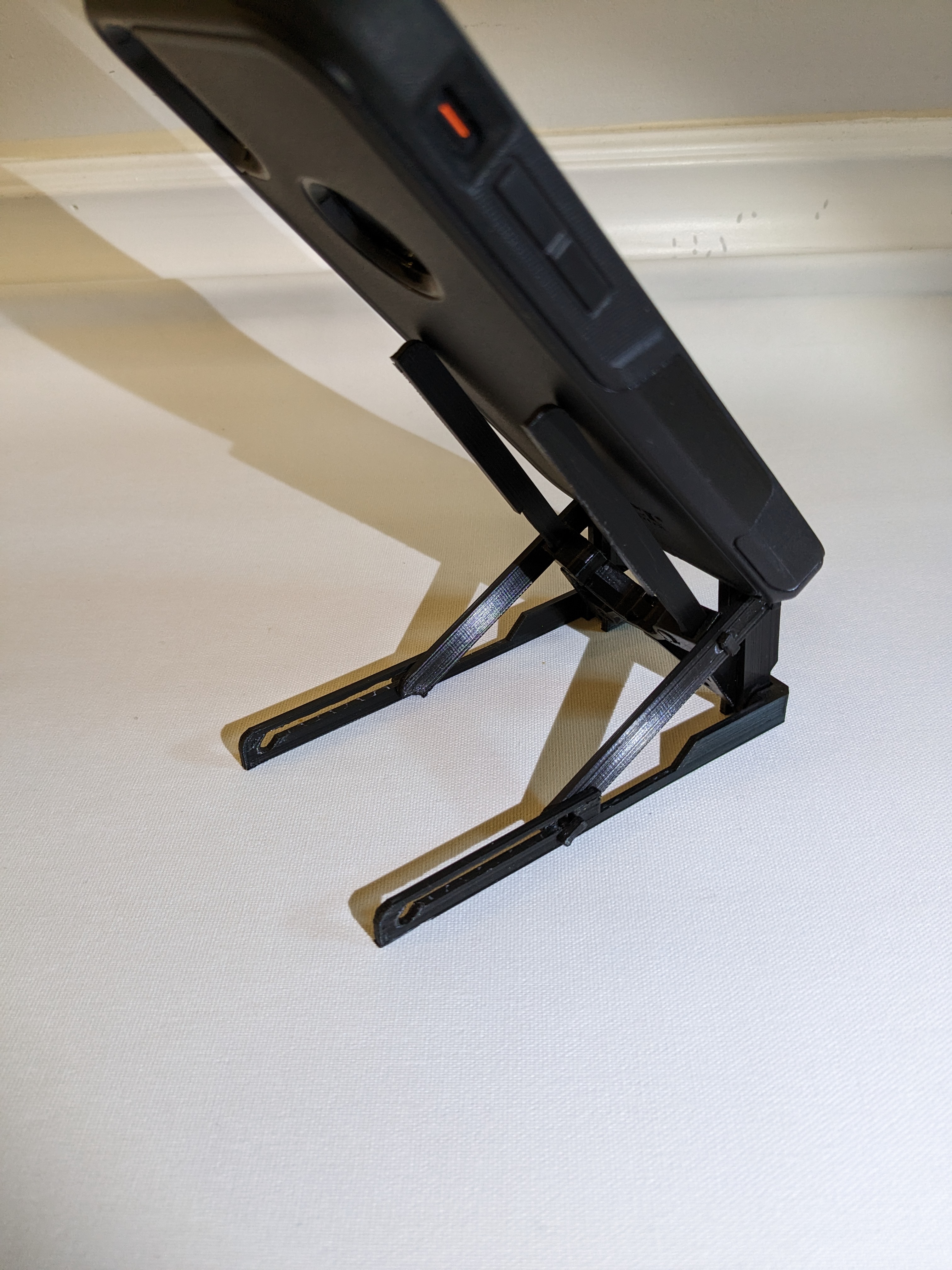 Print-In-Place Folding Phone Holder & Charging Stand