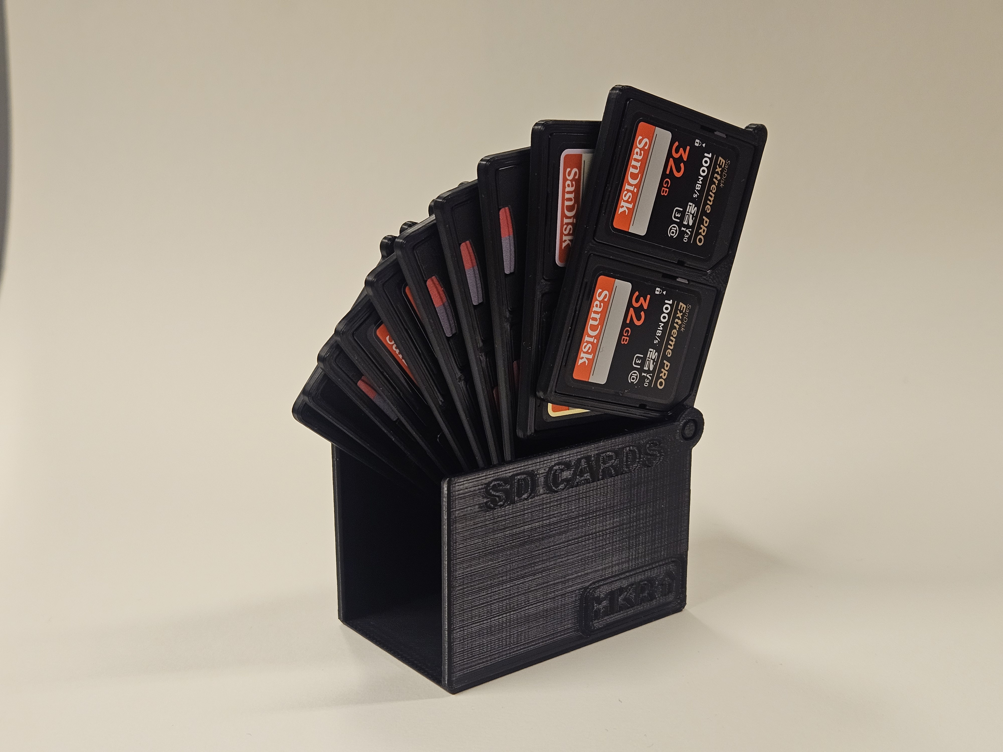 Compact flip out SD card holder, fully printable and parametric
