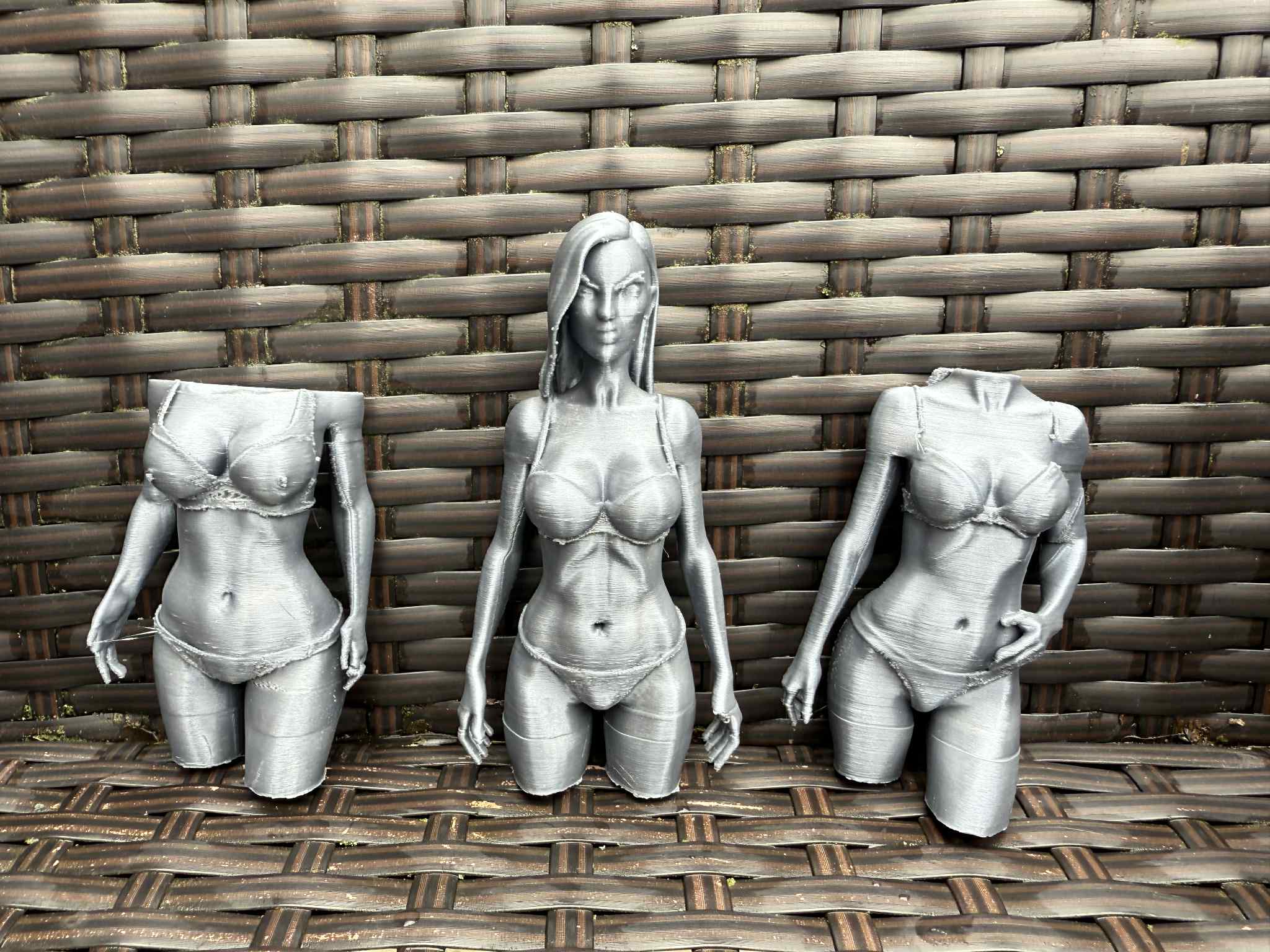 3 mannequins of girls in swimsuits