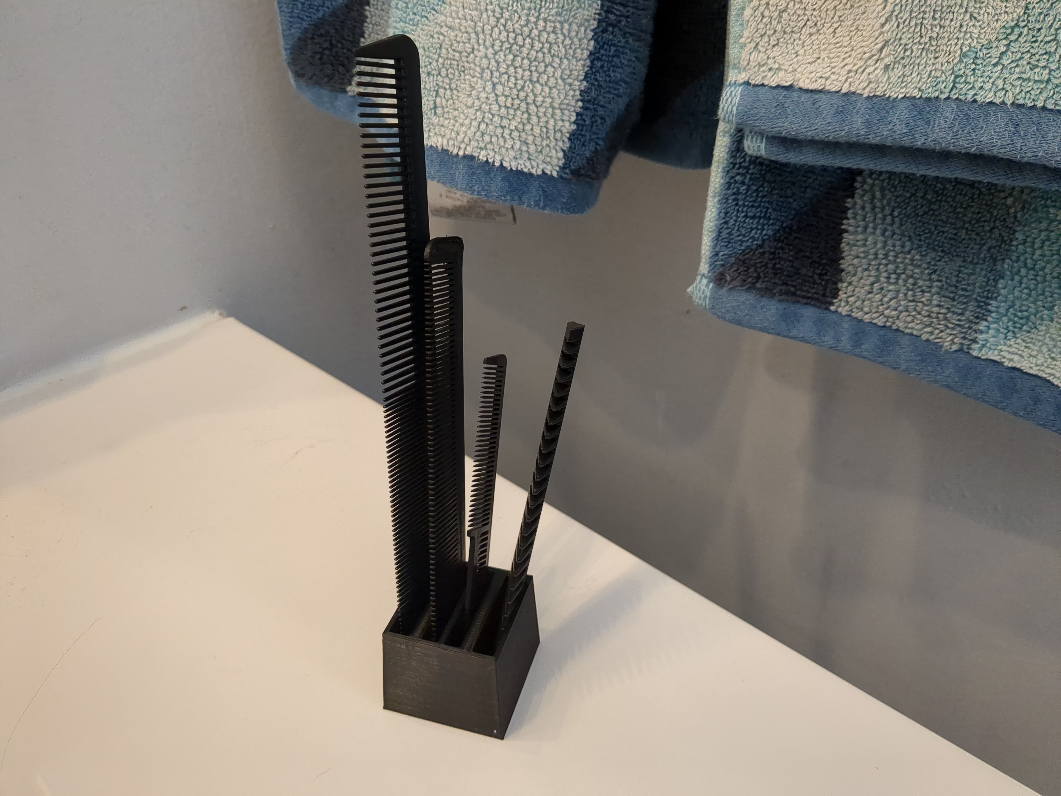 Comb Stand by Ethan Watson Download free STL model