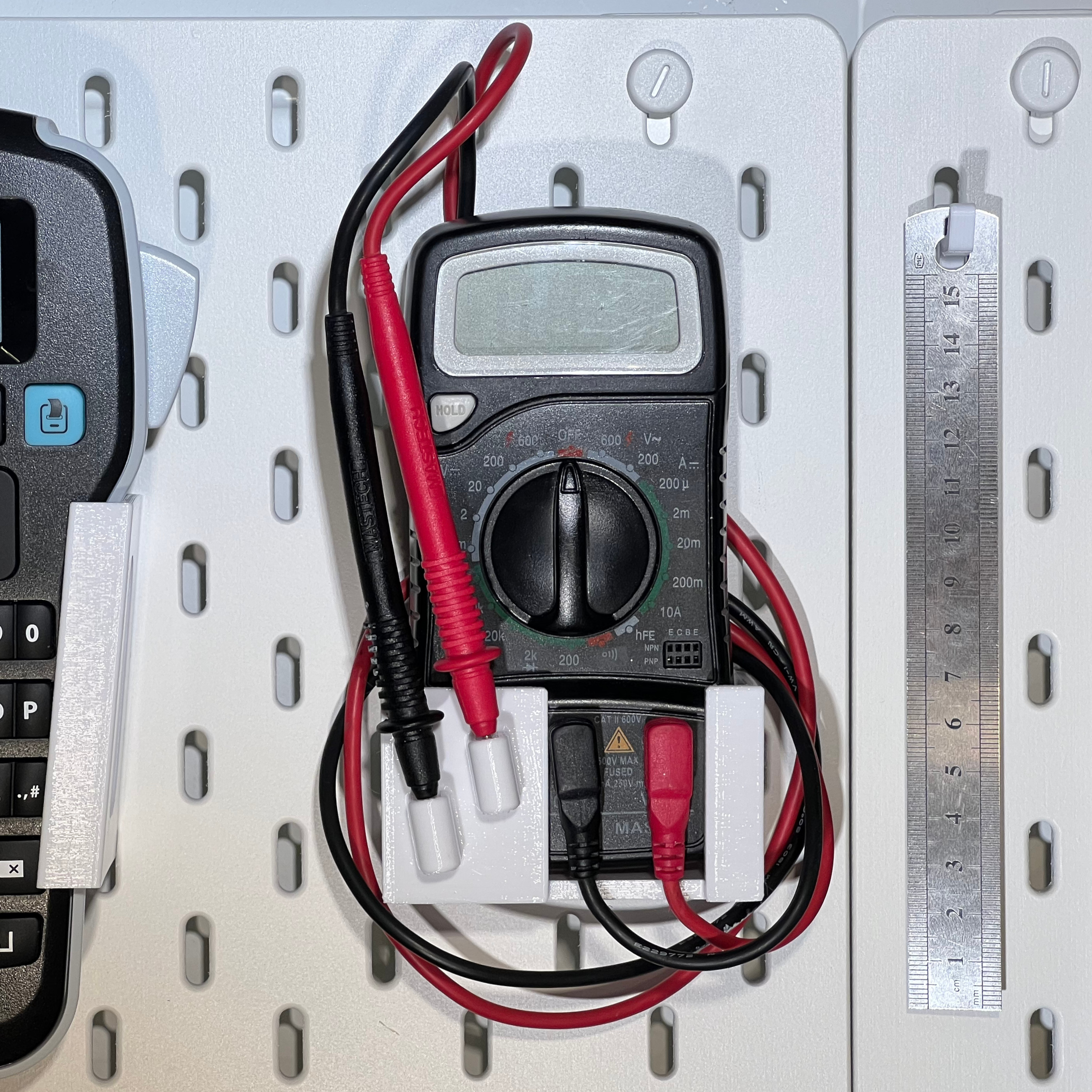 Parametric Multimeter Holder for Skadis Pegboard by KerrickStaley Download free STL model